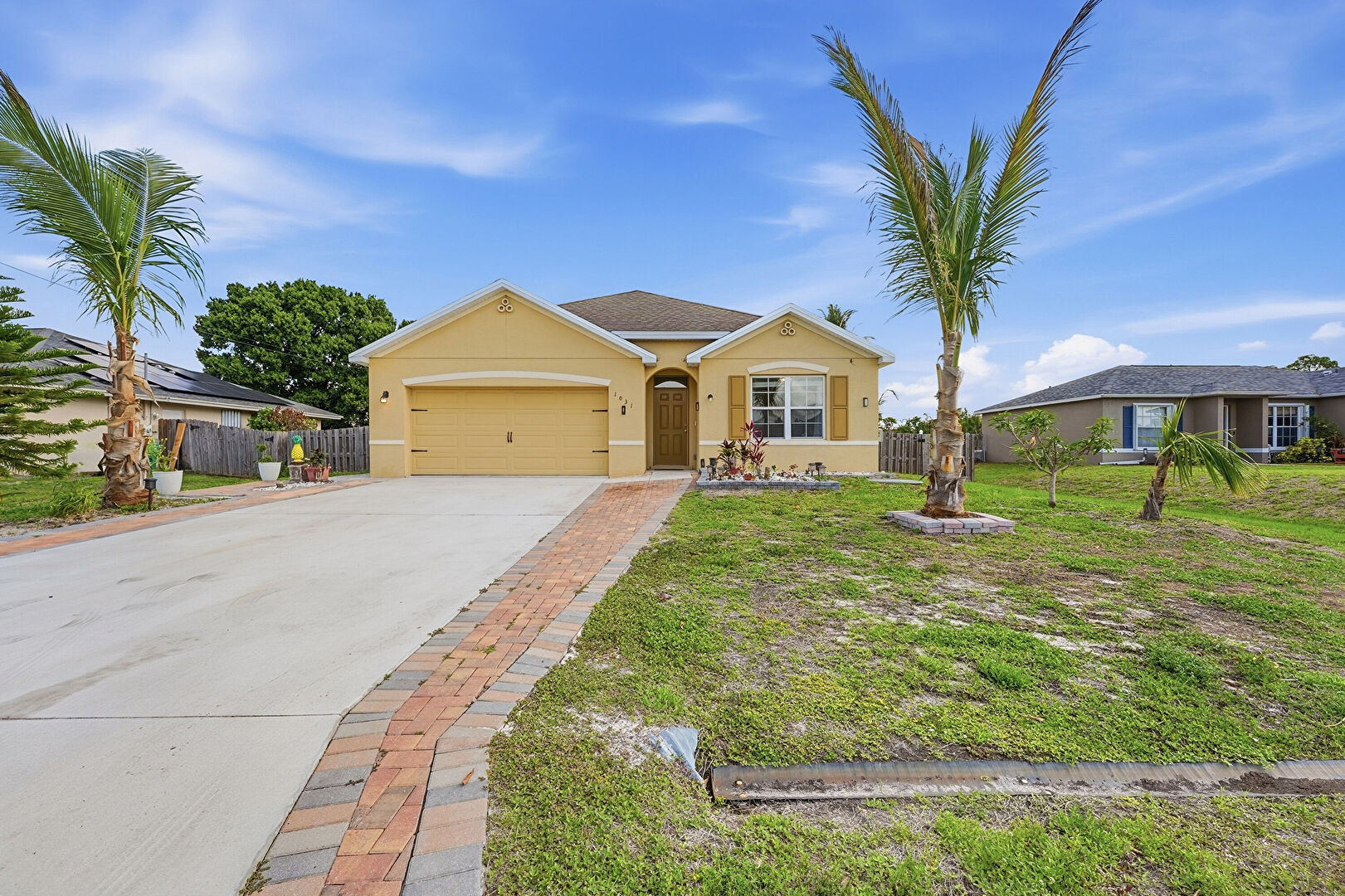 Front at 1031 Southwest Alexandria Avenue, Port St. Lucie, FL 34953, listed by Maria D'Palo