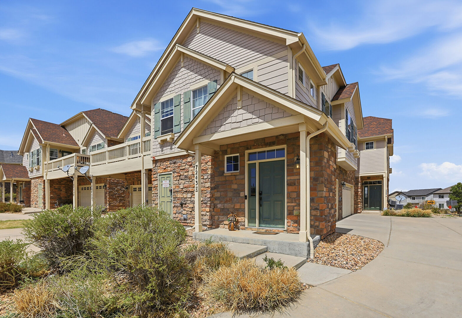 Front at 7243 South Millbrook Court, E, Aurora, CO 80016, listed by The Sewill Team Sean Sewill