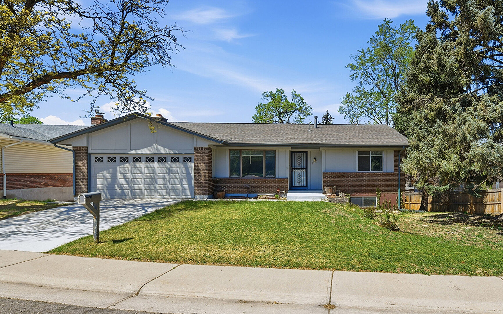 Front at 4115 South Vincennes Court, Denver, CO 80237, listed by Jessica Kuhn