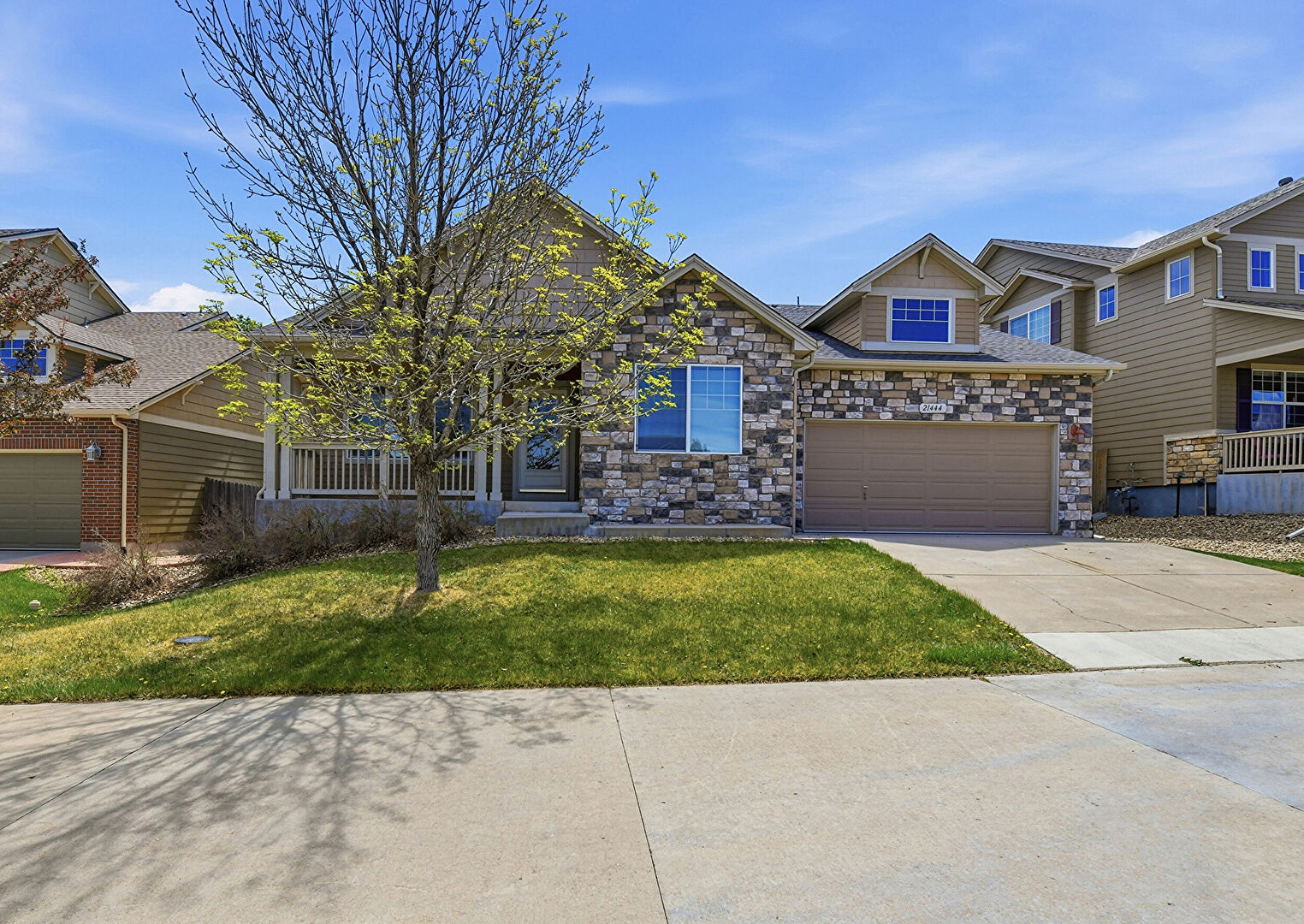 Front at 21444 East Lehigh Avenue, Aurora, CO 80013, listed by Jessica Kuhn