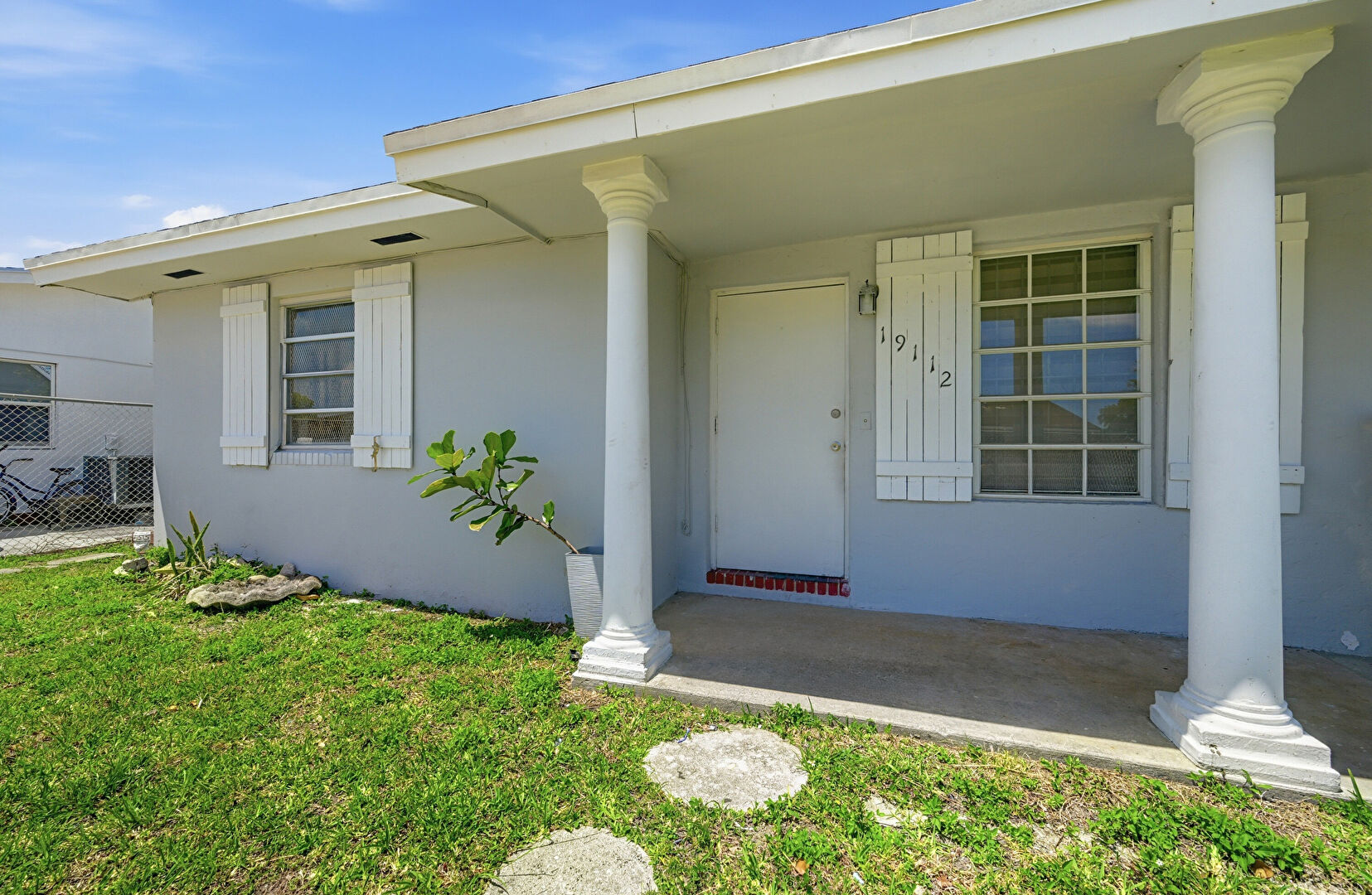 Exterior Entry at 19110 Southwest 113th Place, 19112 SW 113 Pl, Miami, FL 33157, listed by Rachael Barach