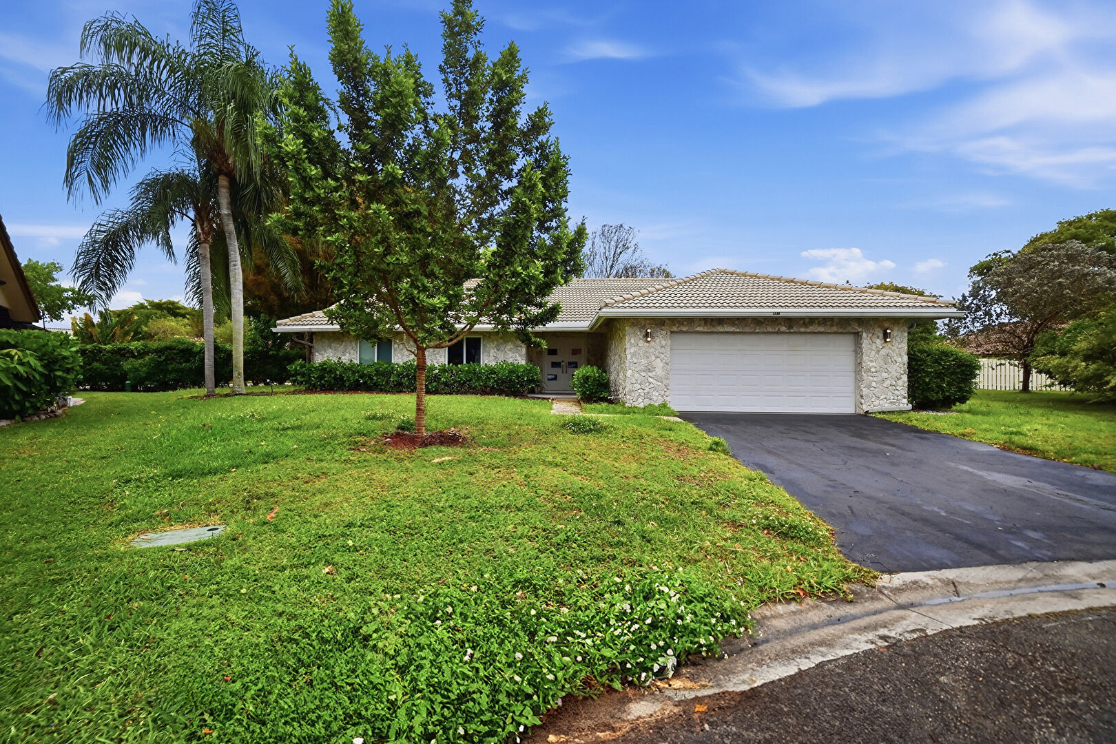 Front at 5036 Northwest 66th Lane, Coral Springs, FL 33067, listed by Ana Garcia