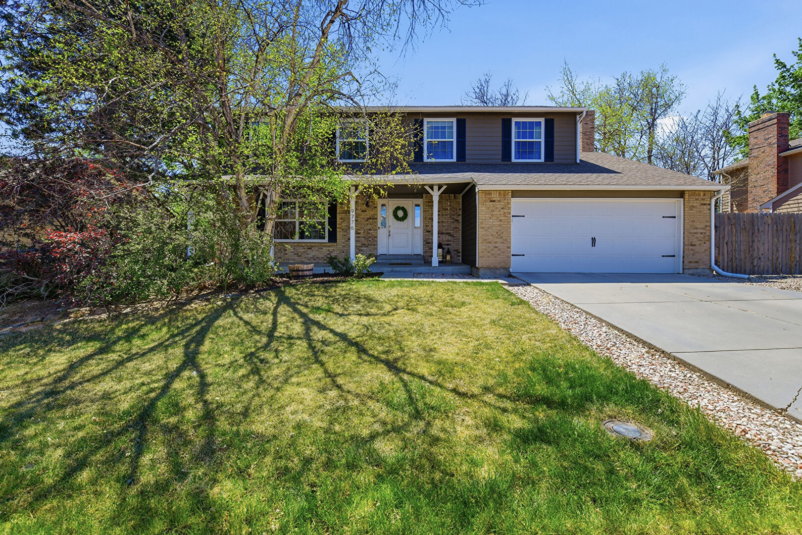 Front at 9776 West Morraine Avenue, Littleton, CO 80127, listed by Cindy Mitchell