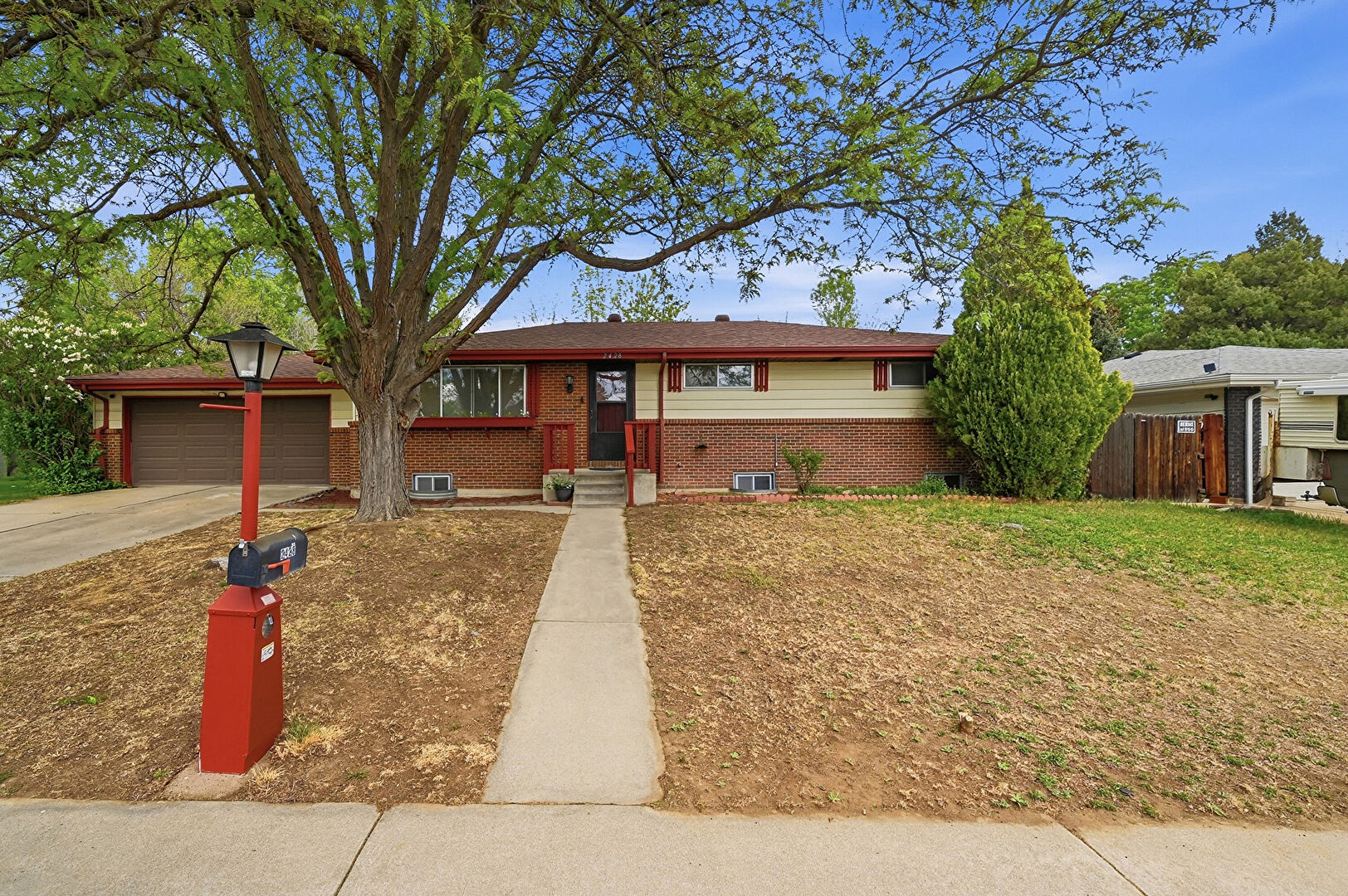 Front at 2428 Atwood Street, Longmont, CO 80501, listed by Lindsey Crisanti