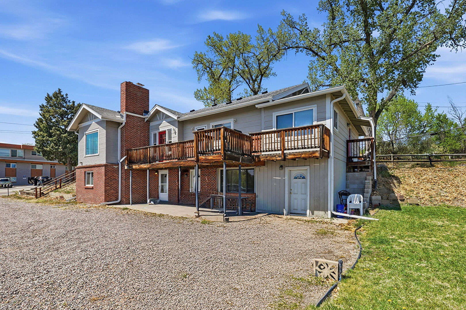 Front at 6190 Wadsworth Boulevard, Unit 2, Arvada, CO 80003, listed by Debra Graves