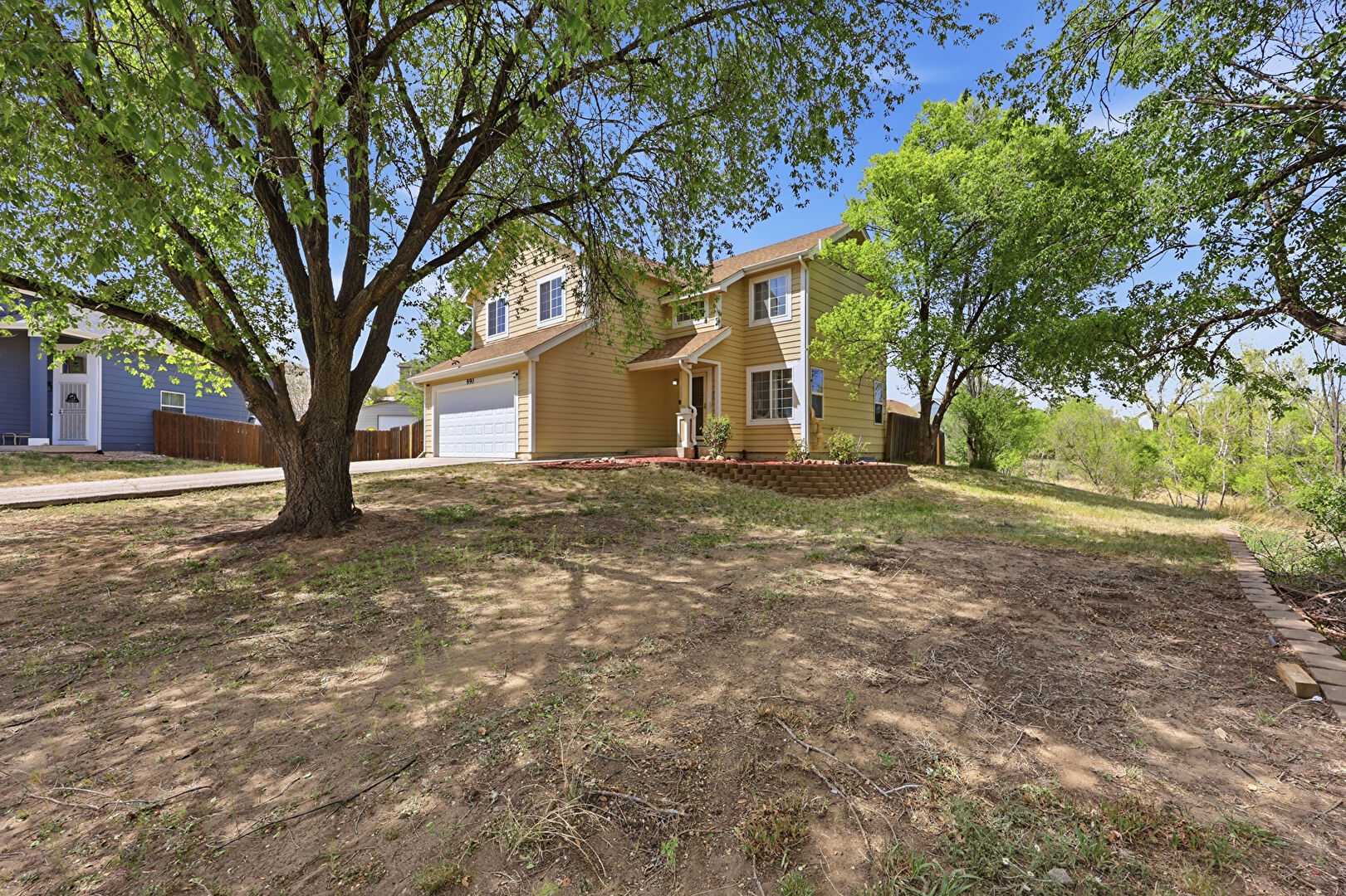 Front at 990 Ridgebury Place, Fountain, CO 80817, listed by M. Blaine Johnson