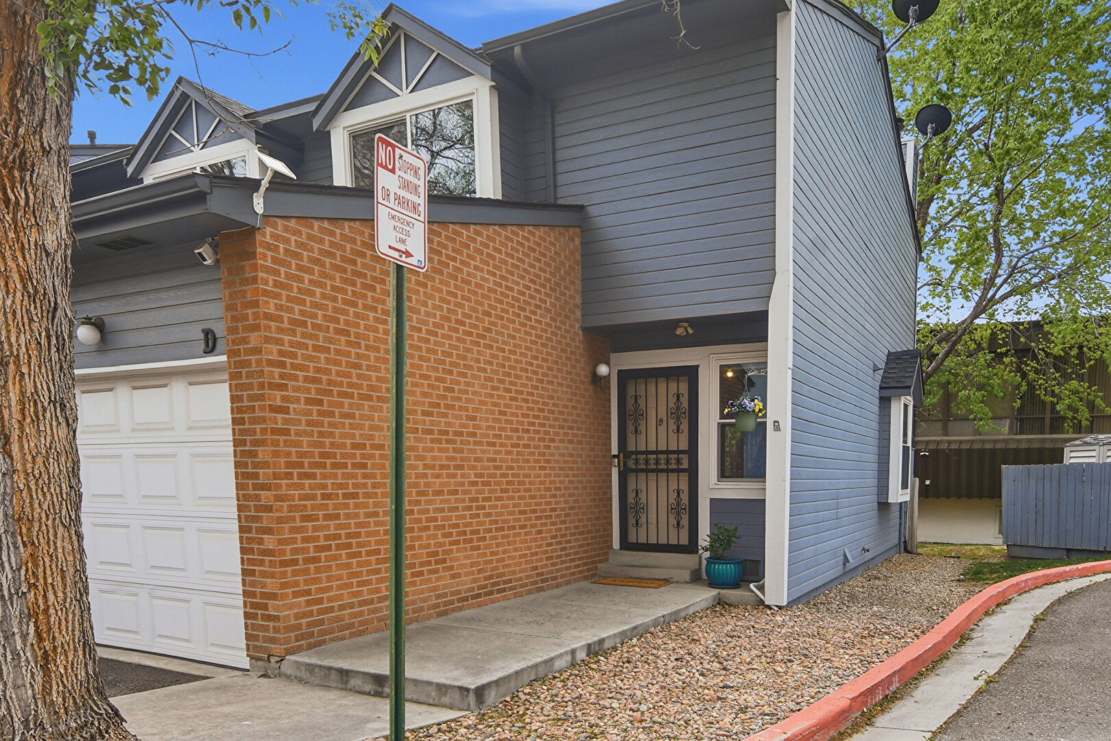 Front at 1693 Carr Street, Unit D, Lakewood, CO 80214, listed by Jenny Penman