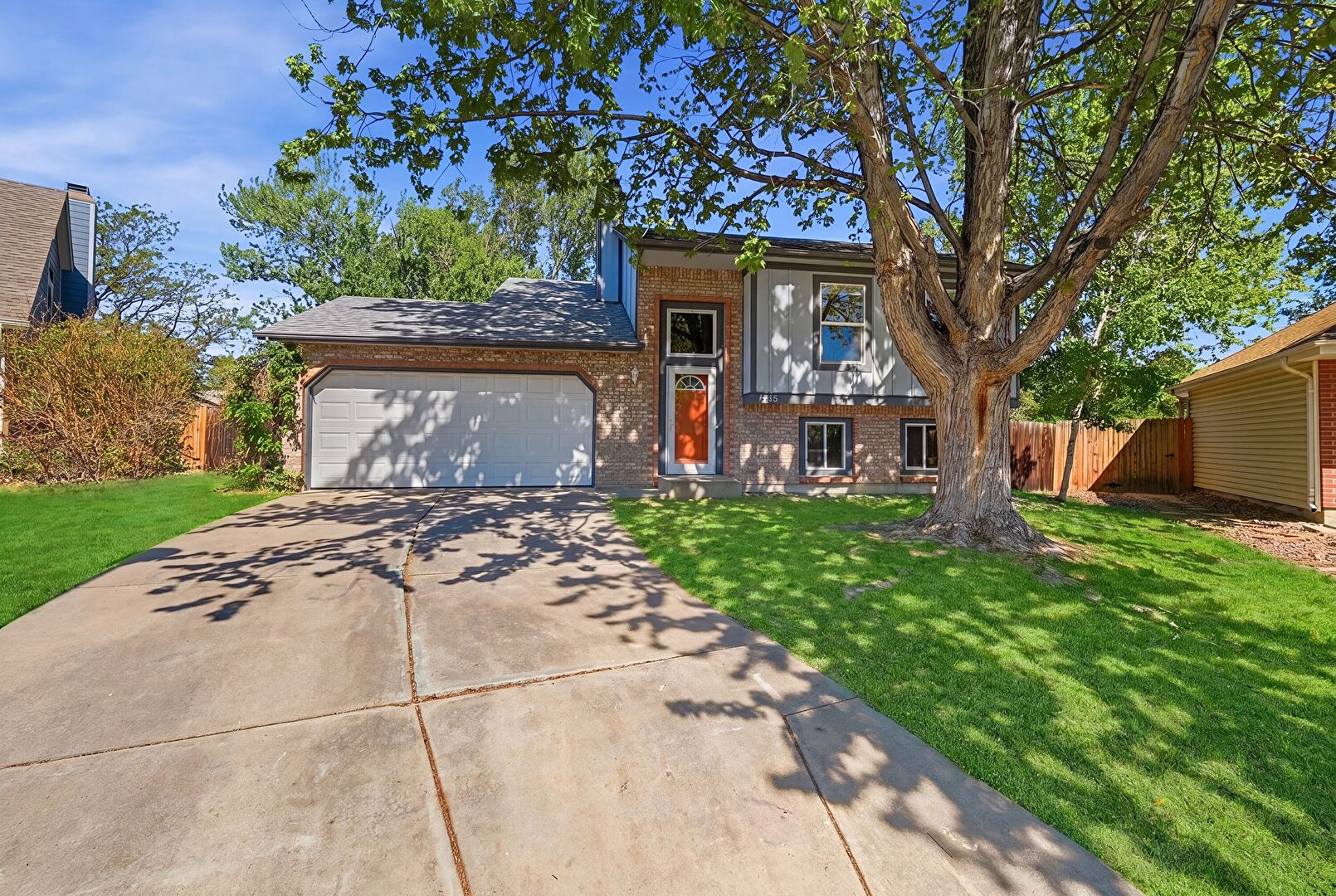 Front at 13755 West 65th Drive, Arvada, CO 80004, listed by Dawn Faust