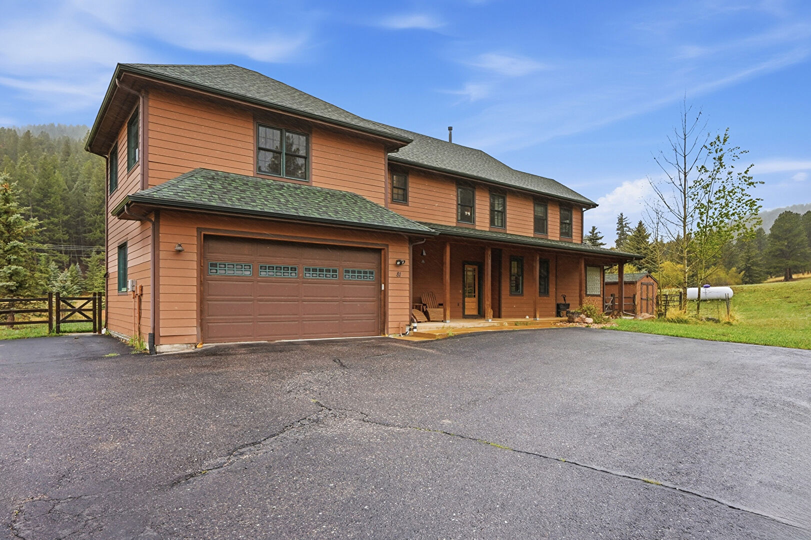Front at 81 Elmgreen Lane, Evergreen, CO 80439, listed by Sandra Bosworth