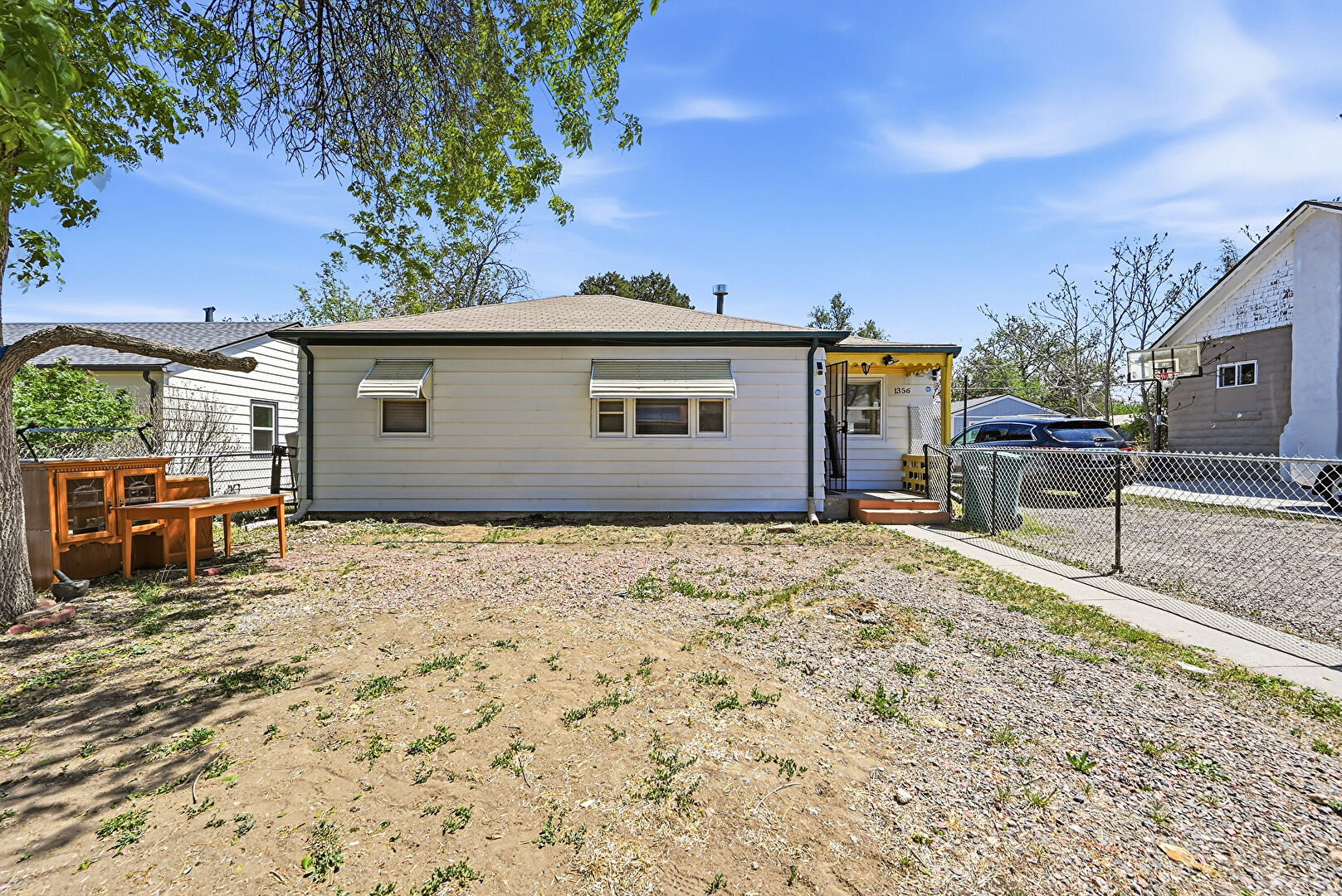 Back at 1356 Iola Street, Aurora, CO 80010, listed by Azam Aslamy