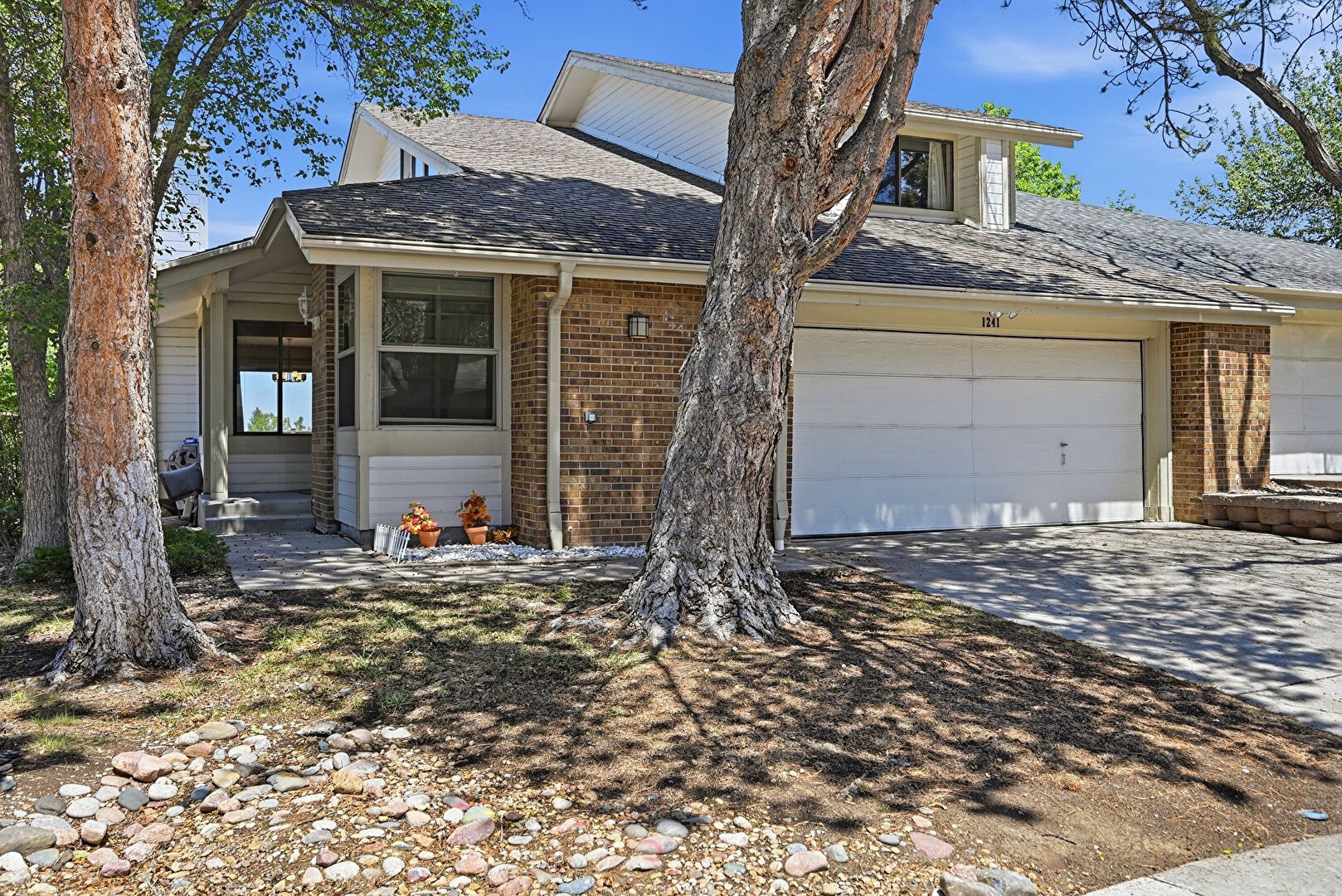 Front at 1241 Northcrest Drive, Highlands Ranch, CO 80126, listed by Russ Porter