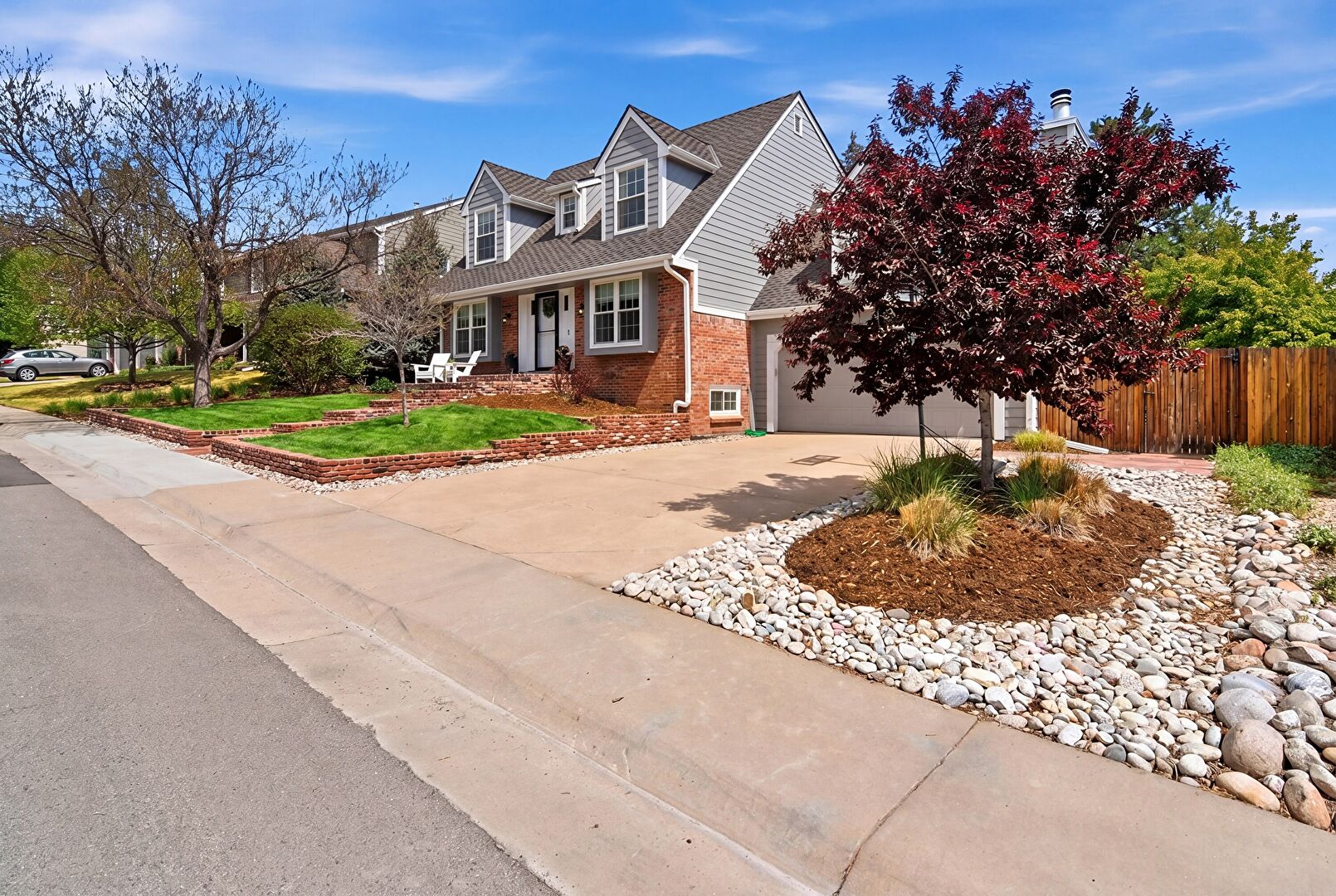 Front at 5973 East Irwin Place, Centennial, CO 80112, listed by Eric Johnson