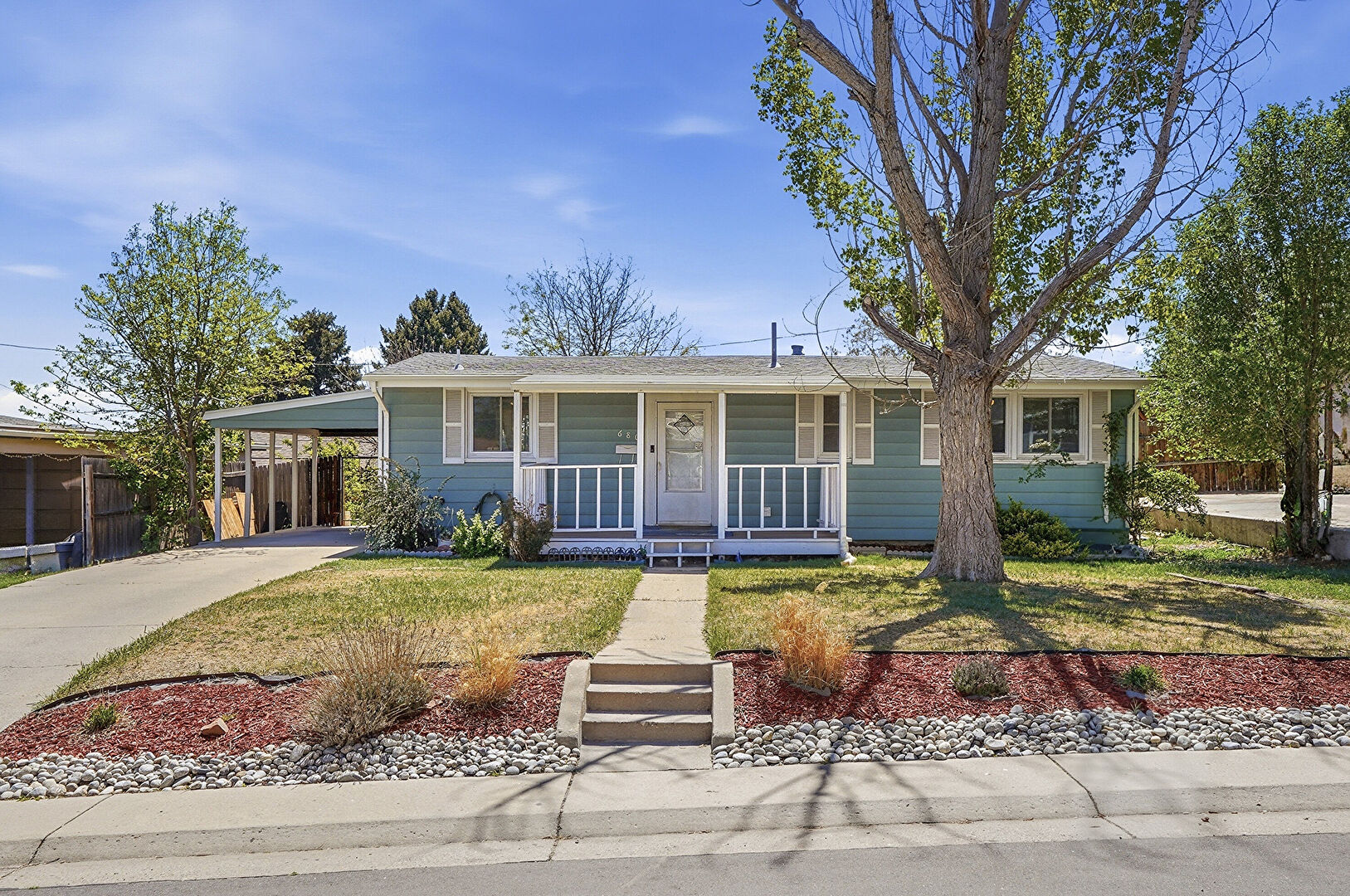 Front at 680 Cortez Street, Denver, CO 80221, listed by Martin Romero