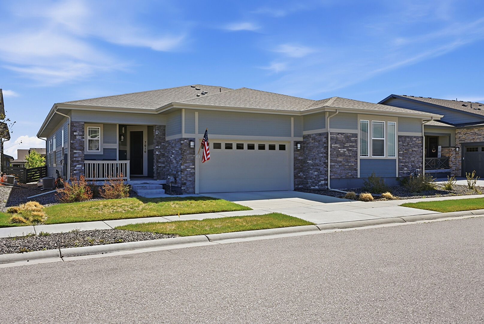 Front at 7010 Sagerock Road, Castle Pines, CO 80108, listed by Kathryn Carlson