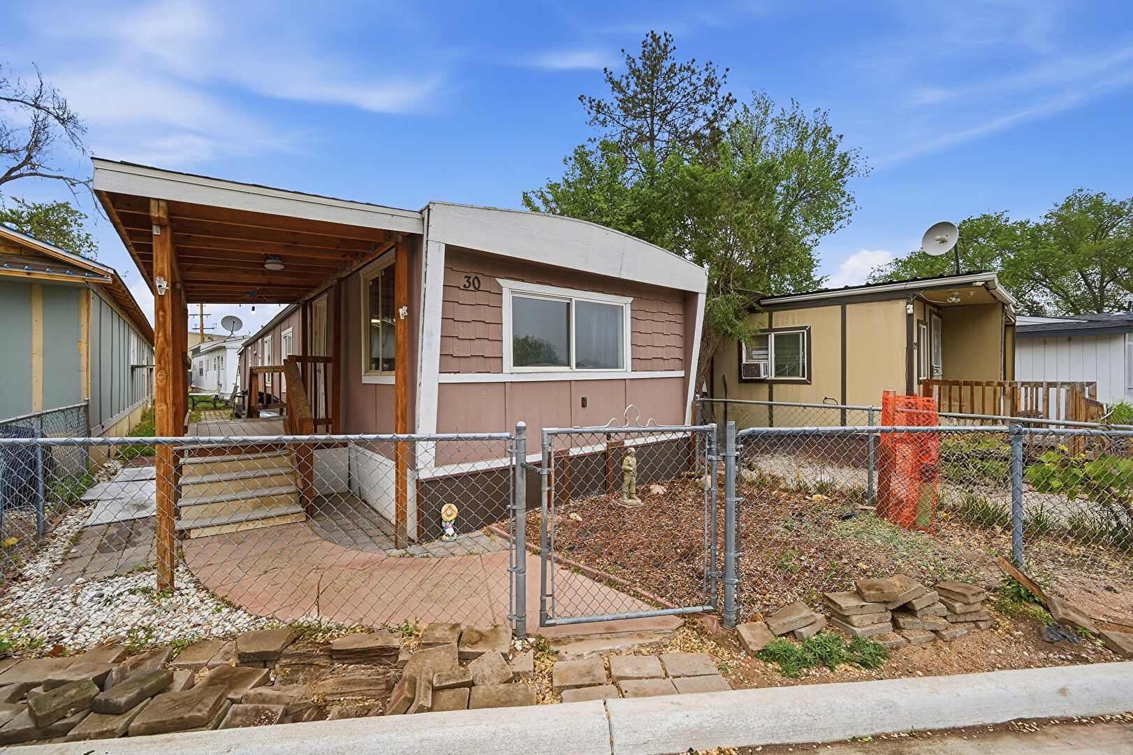 Front at 411 South Court Street, Lot 30, Fort collins, CO 80524, listed by Jose Hernandez