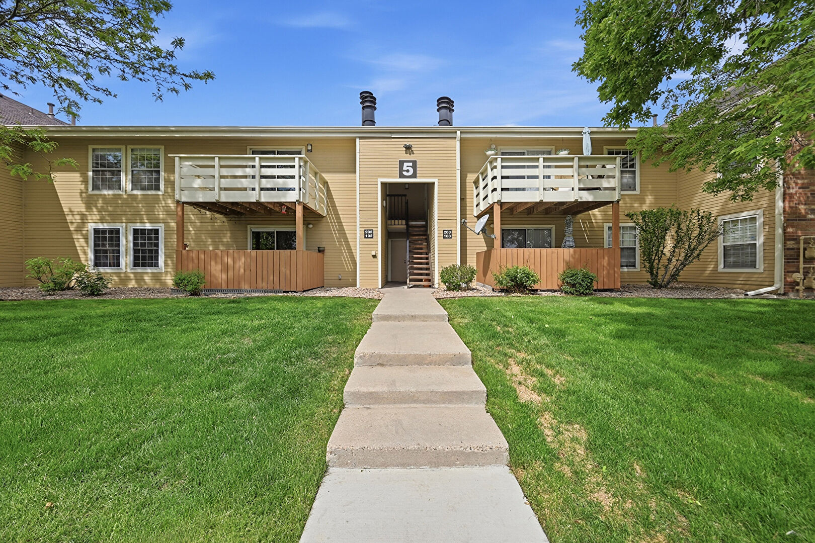 Front at 10251 West 44th ave, building 5, unit 202, Wheat Ridge, CO 80033, listed by Chandler Lee