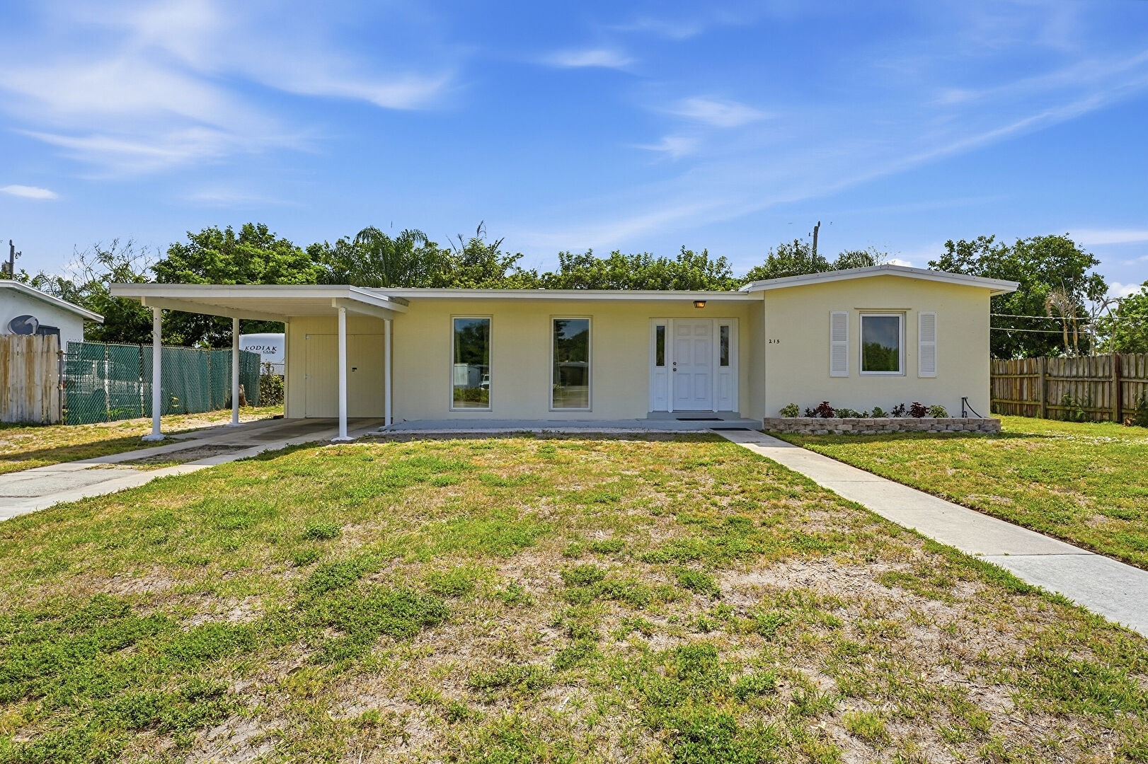 Front at 215 Southeast Airoso Boulevard, Port St. Lucie, FL 34983, listed by Burt Hogan