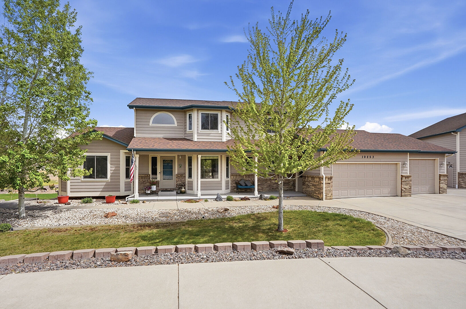 Front at 10253 East 150th Avenue, Brighton, CO 80602, listed by Colleen Vandendriessche
