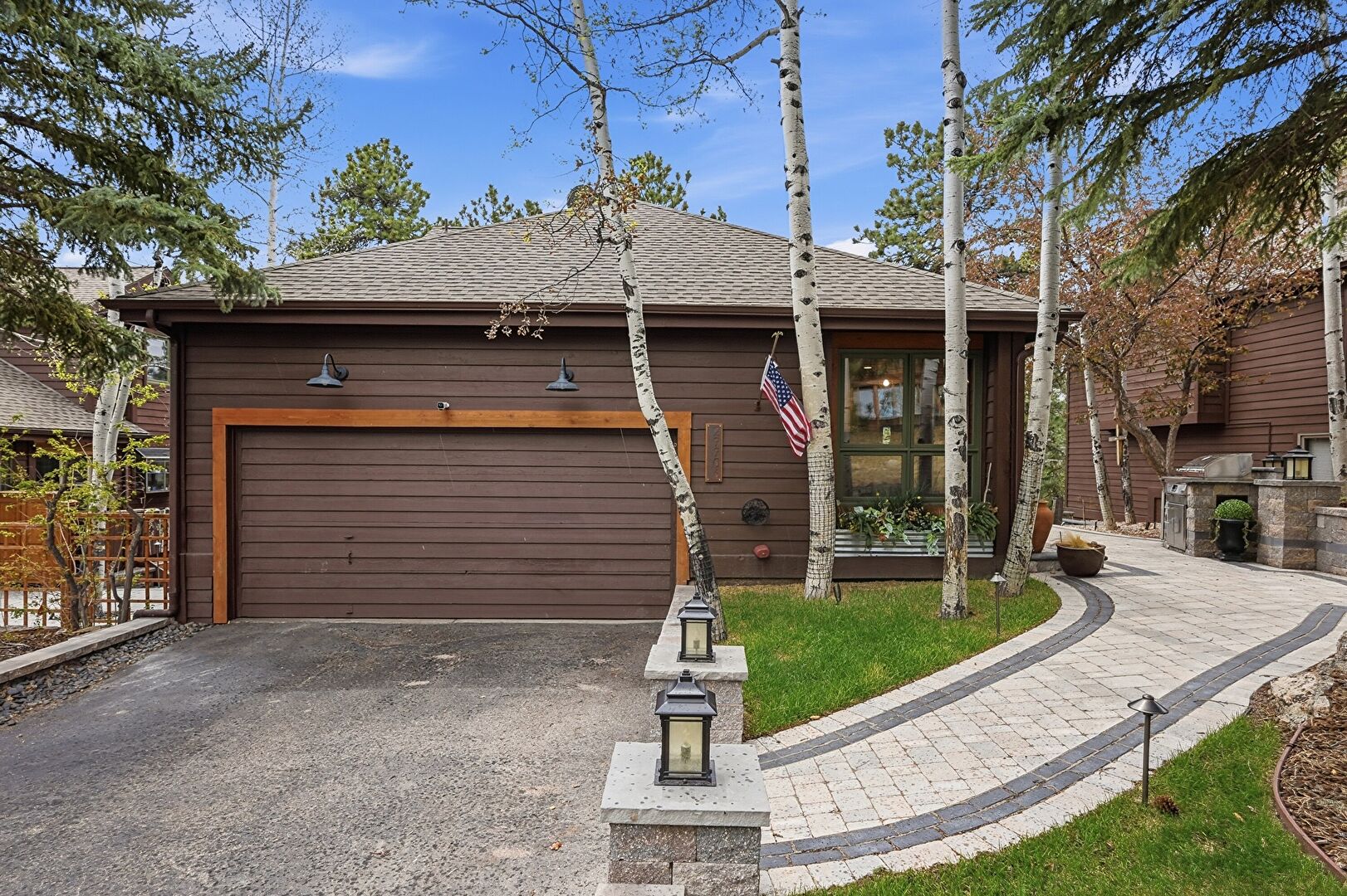 Front at 29906 Troutdale Park Place, Evergreen, CO 80439, listed by Jenna and Patrick McMenaman
