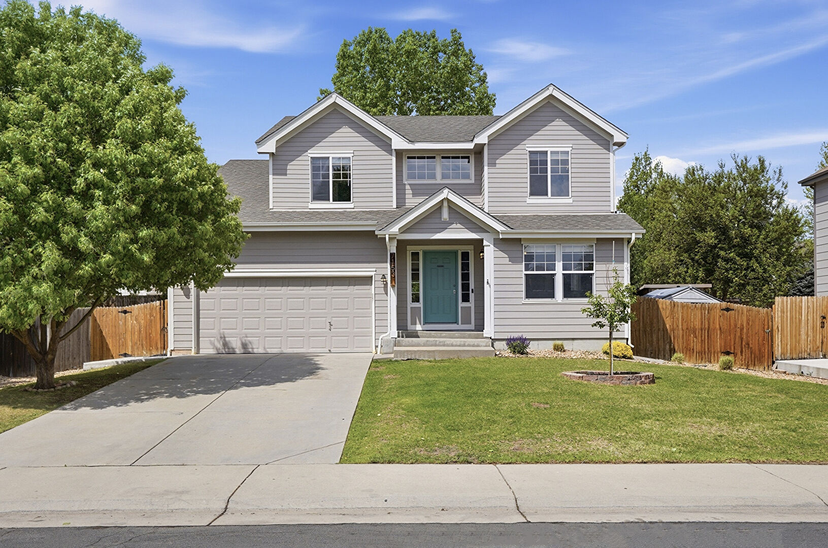 Front at 7153 Canyon Avenue, Longmont, CO 80504, listed by Luz Daniels