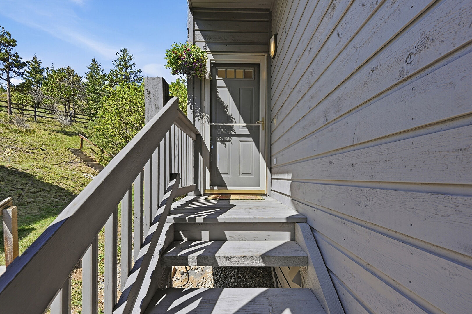 Balcony at 3667 Joyful Way, Unit A, Evergreen, CO 80439, listed by Pandora & John Erlandson, MLS ID: 5074262