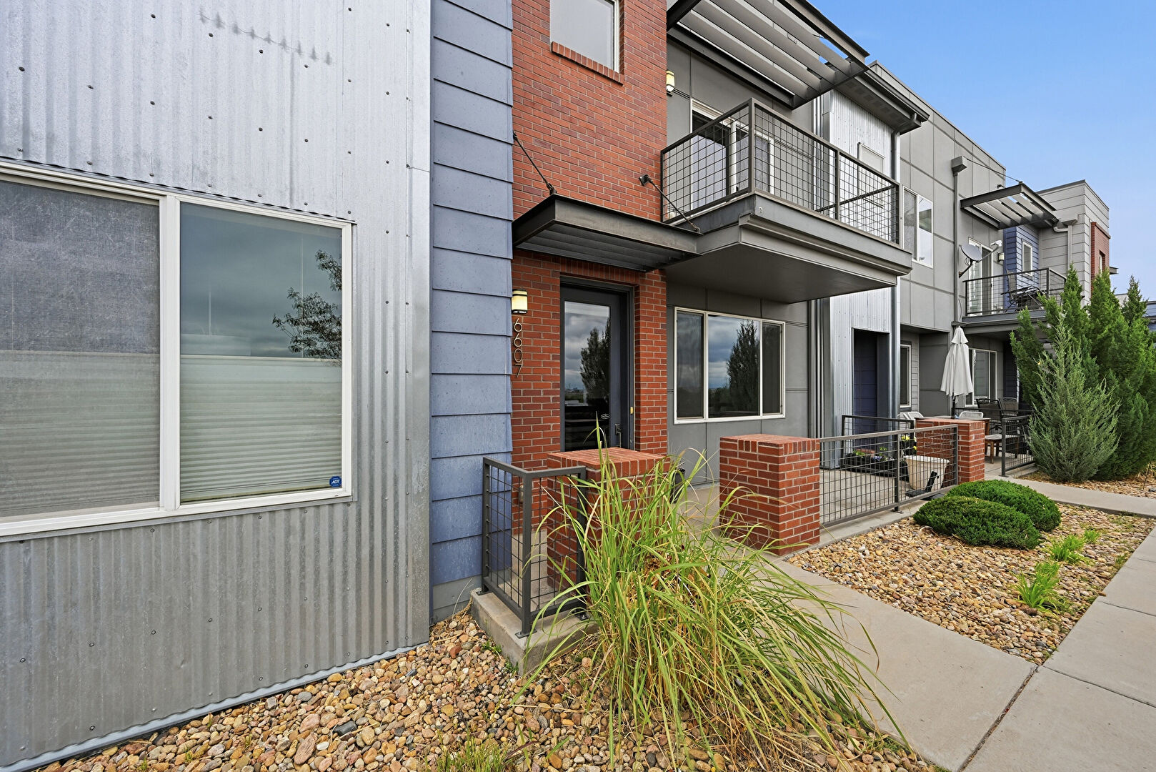 Exterior Entry at 6607 Morrison Drive, Denver, CO 80221, listed by Taylor Haas