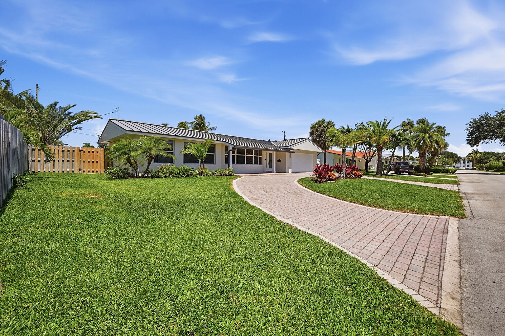 Front yard at 4111 Northeast 26th Terrace, Lighthouse Point, FL 33064, listed by Jordan Nitto