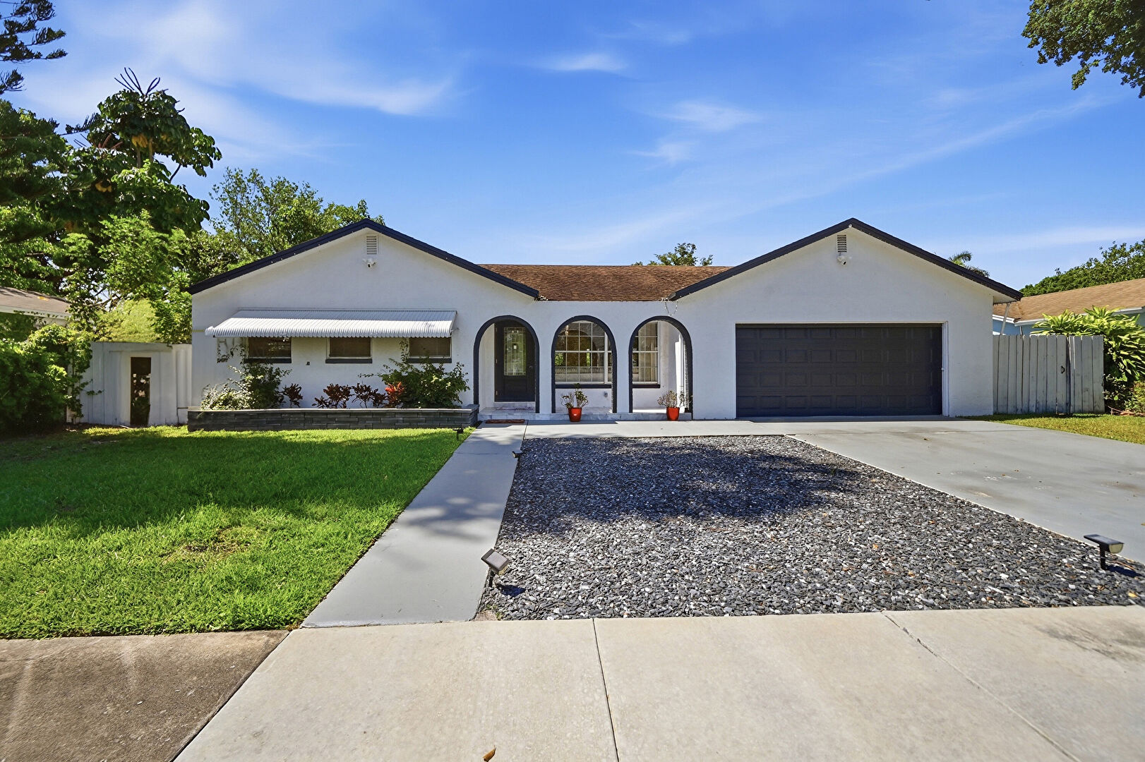 Front at 8972 Southwest 8th Street, Boca Raton, FL 33433, listed by Gloria Satkowski