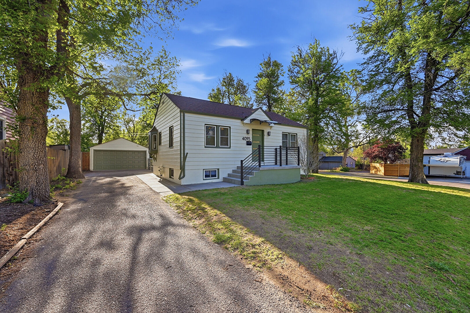 Front at 4095 Depew Street, Wheat Ridge, CO 80212, listed by Robert Gruber