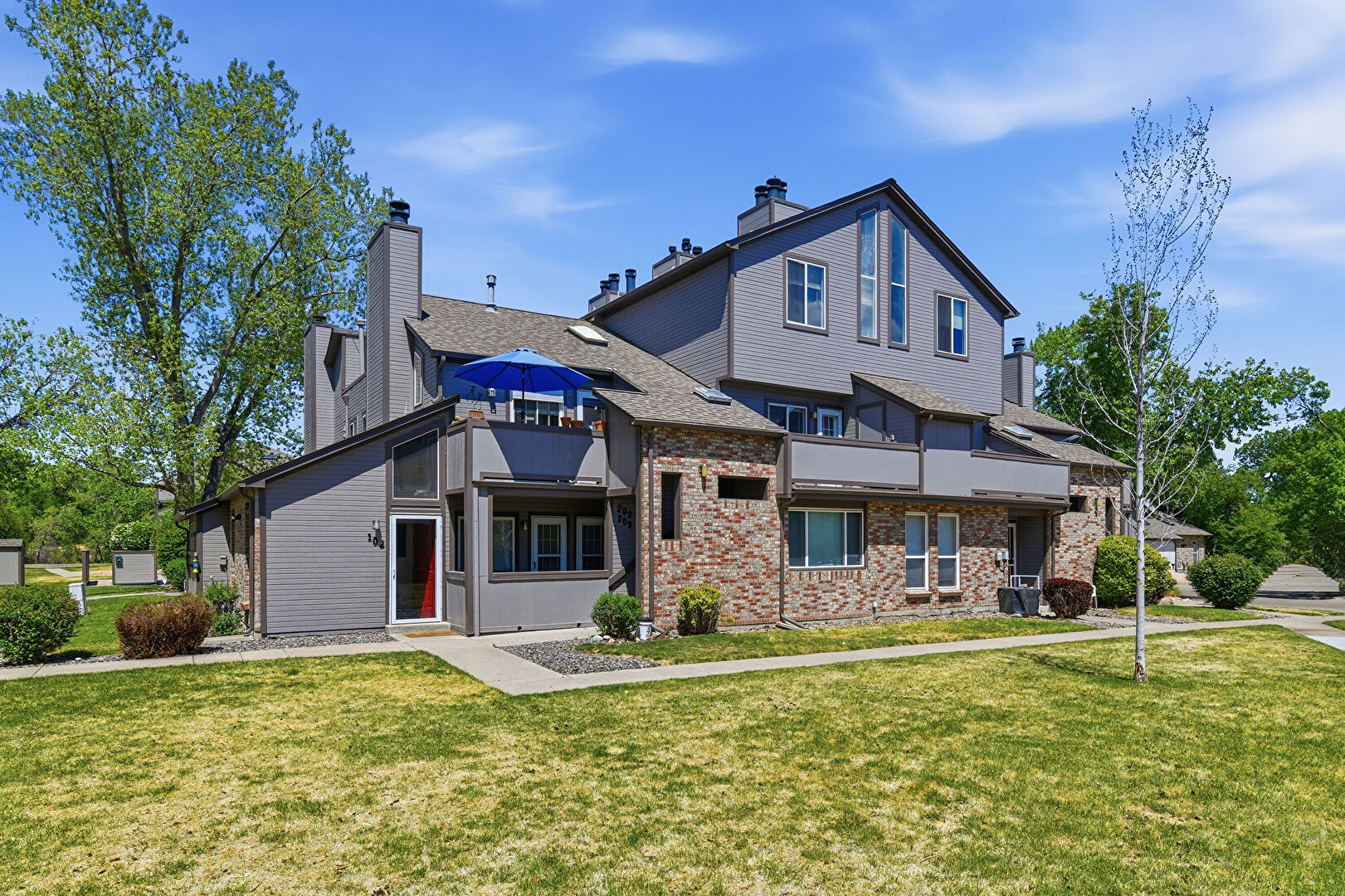 Front at 5041 Garrison Street, Unit 202, Wheat Ridge, CO 80033, listed by Colleen Simpson