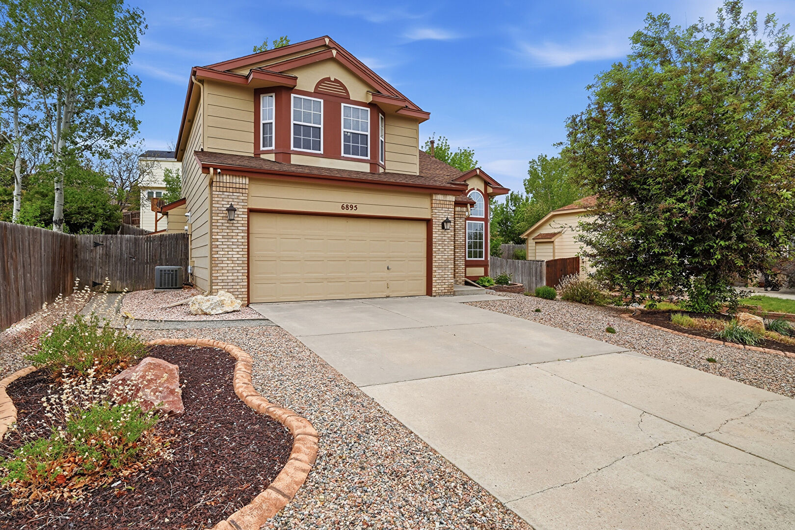 Front at 6895 Quicksilver Drive, Colorado Springs, CO 80922, listed by Lance Thibault