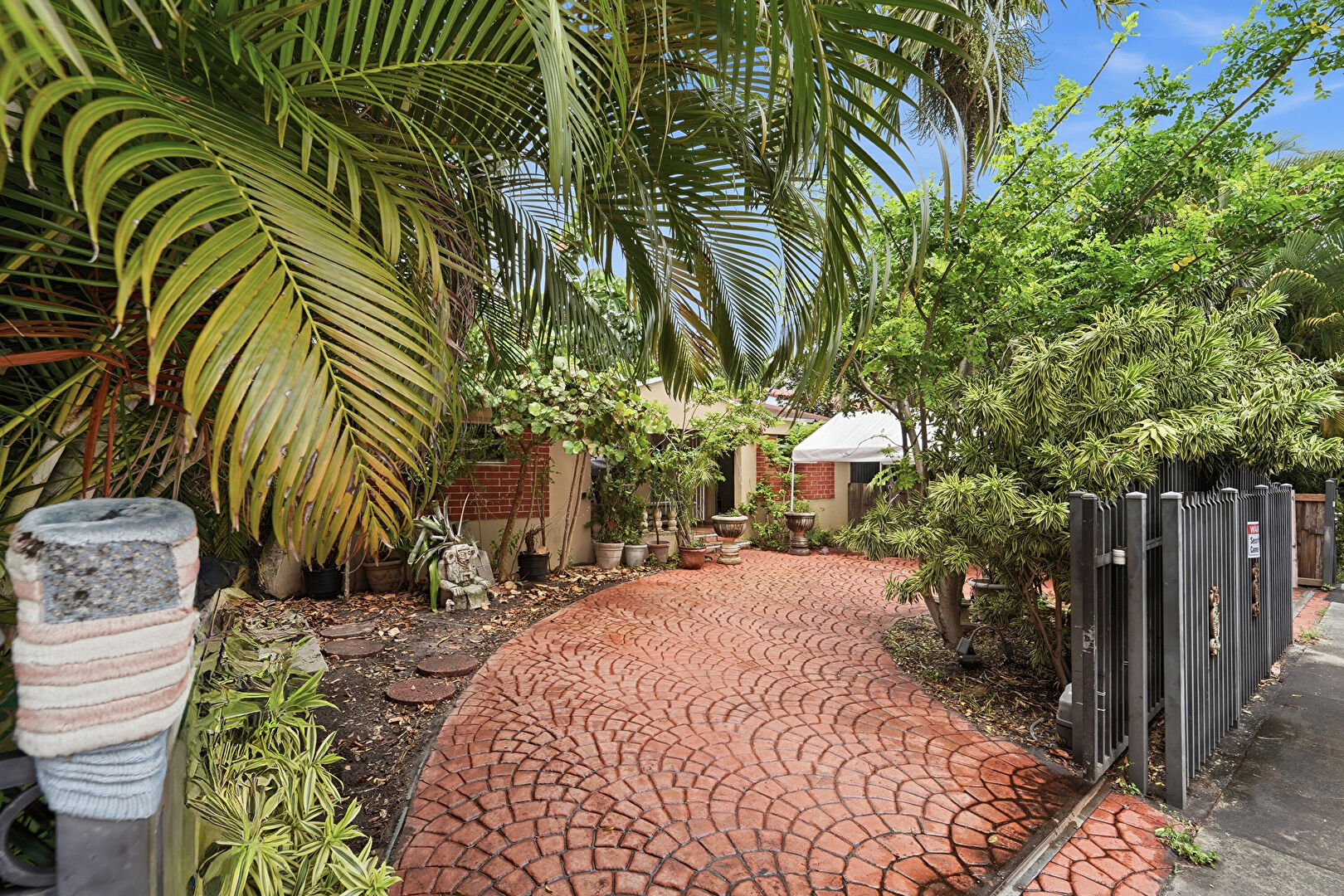 Front at 50 Southwest 58th Court, Miami, FL 33144, listed by Ana Garcia