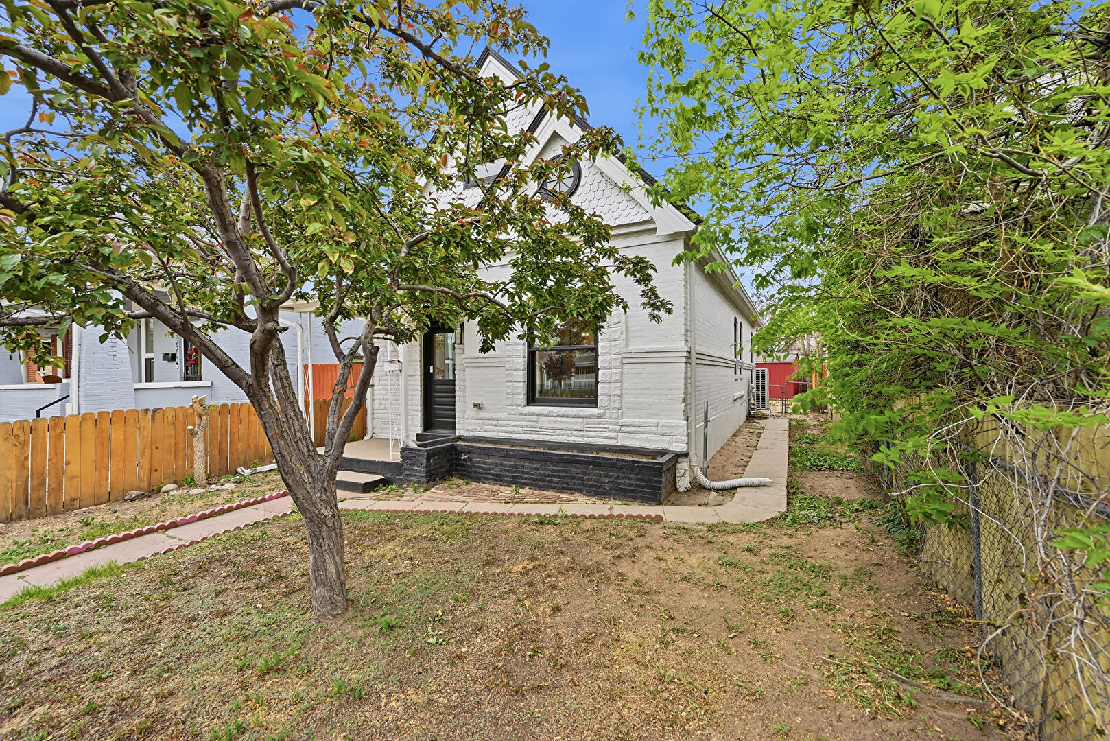 Front at 3216 Curtis Street, Denver, CO 80205, listed by Taylor Haas