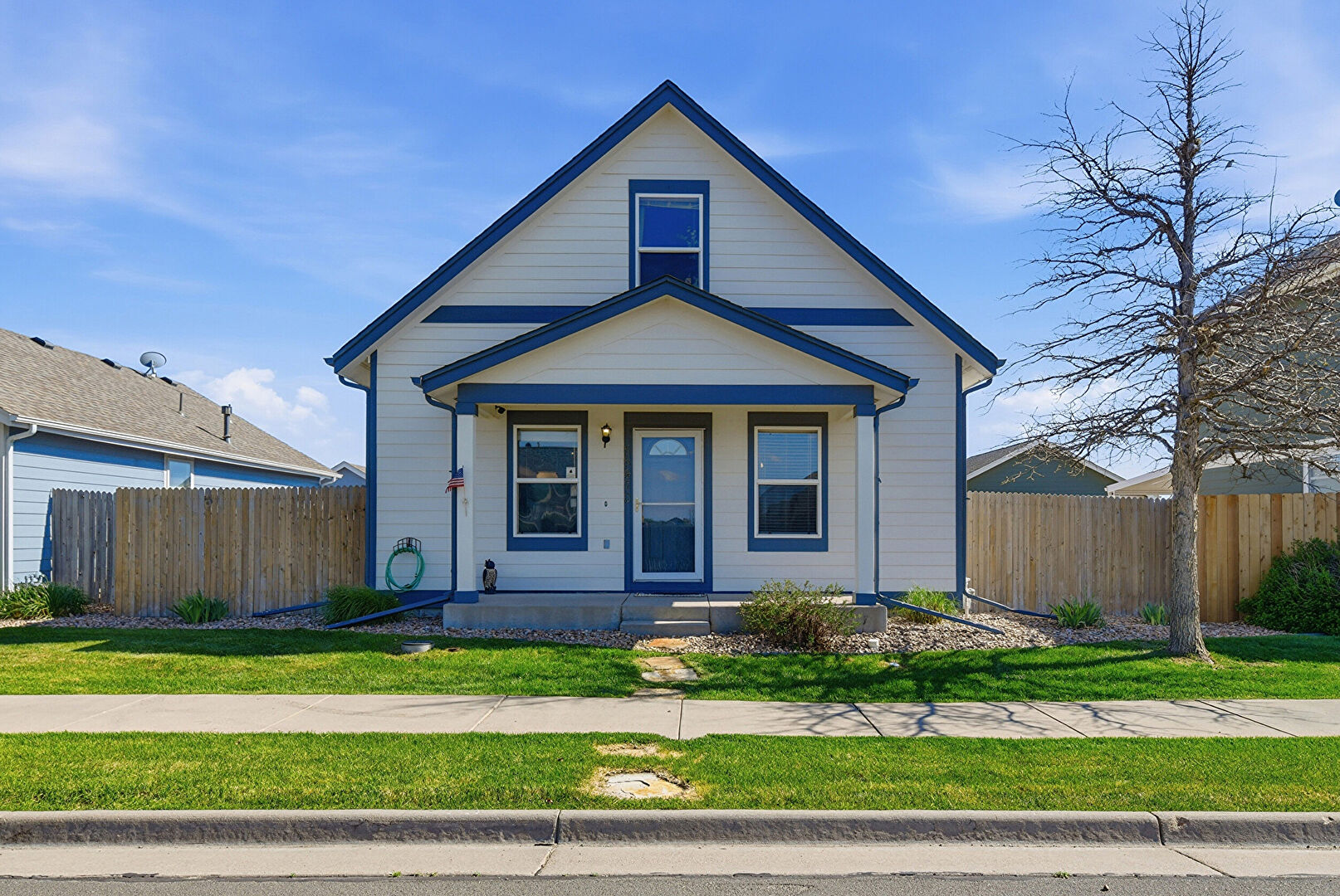Front at 55470 East 27th Place, Strasburg, CO 80136, listed by David Hamrick