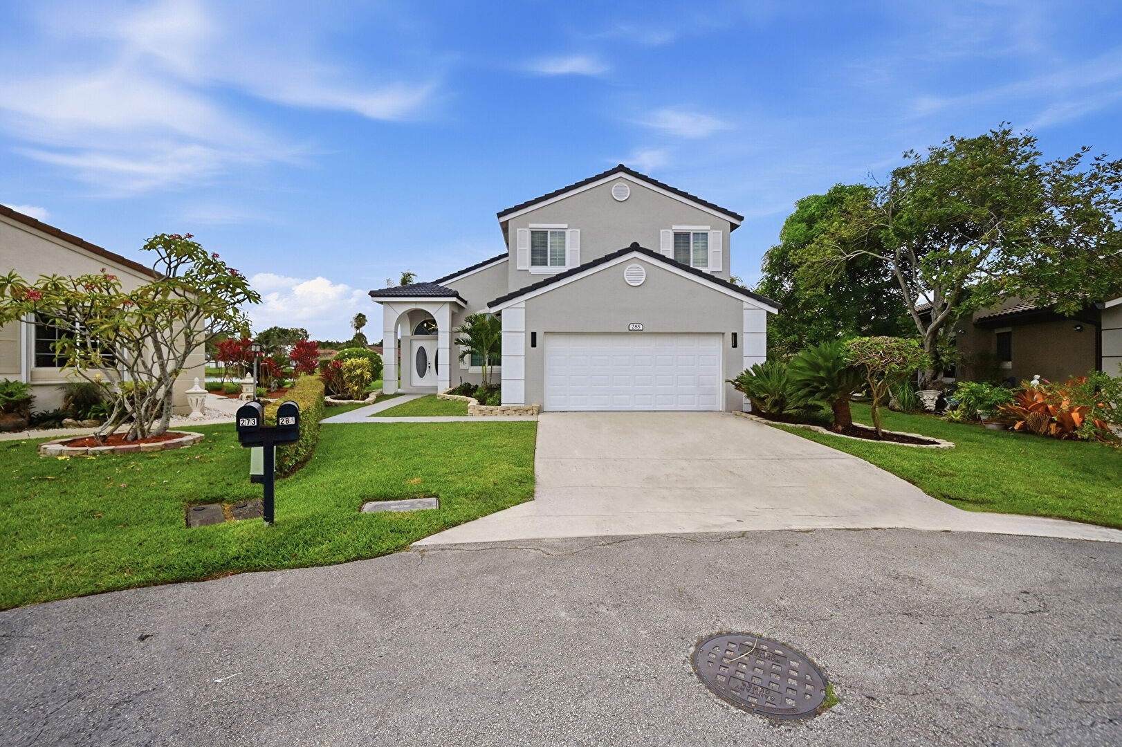 Front yard at 285 Northwest 45th Terrace, Deerfield Beach, FL 33442, listed by Devin Kalvaitis