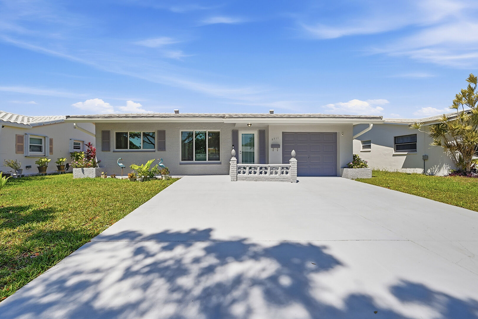 Front at 5711 Northwest 84th Terrace, Tamarac, FL 33321, listed by Dionne Sims