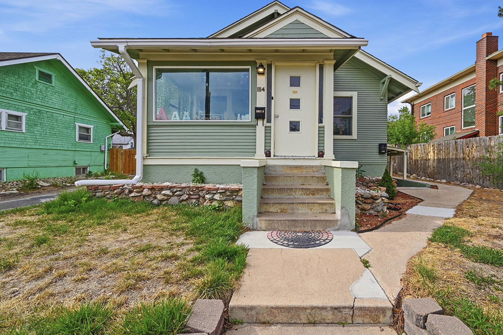 Front at 1114 15th Street, Greeley, CO 80631, listed by Regina Naves