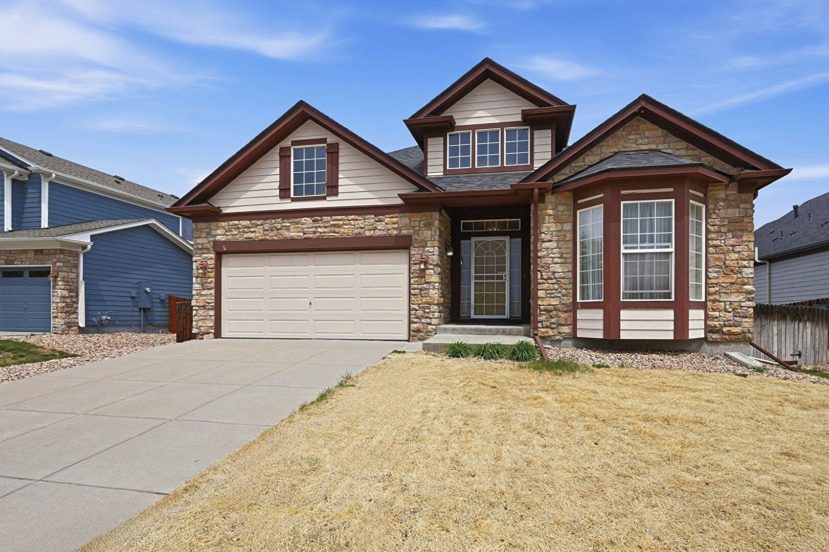 Front at 5949 East 114th  Avenue, Thornton, CO 80233, listed by Sandi Hewins