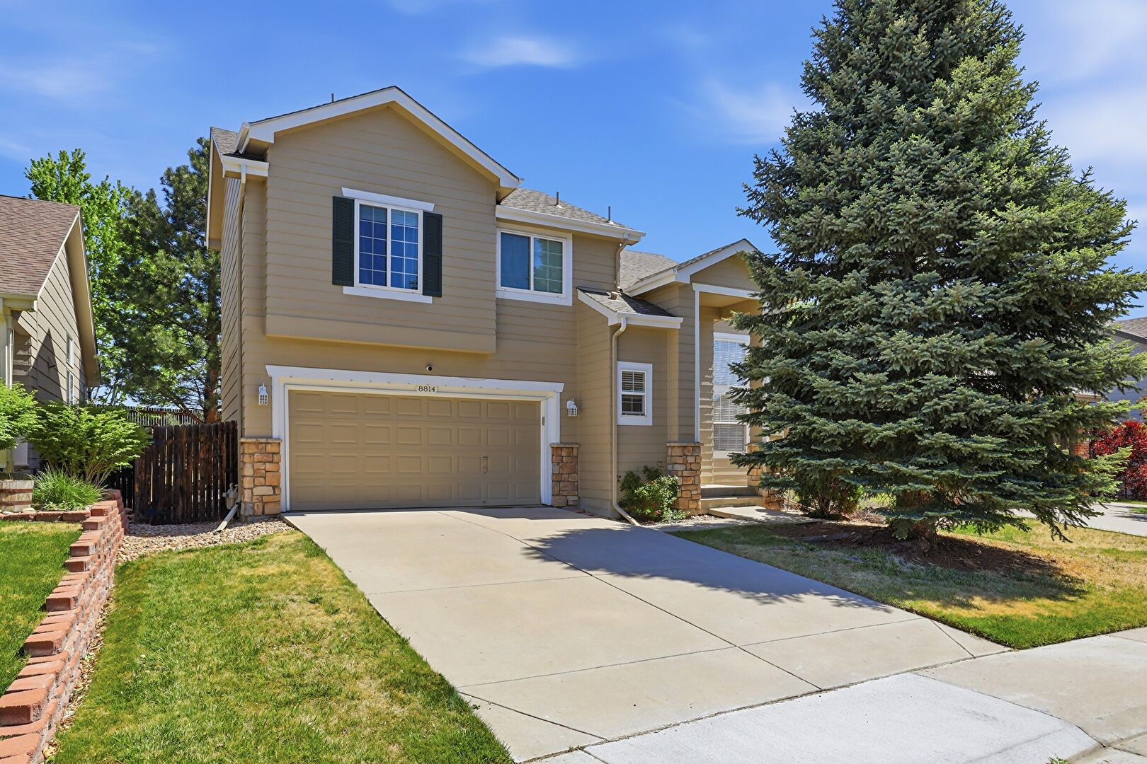 Front at 8814 South Field Court, Littleton, CO 80128, listed by Haley Hart