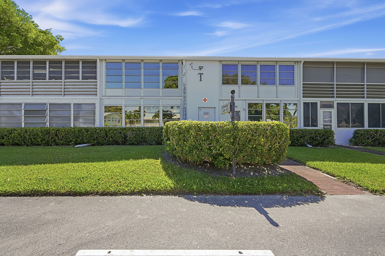 Front at 551 Durham Circle, T, Deerfield Beach, FL 33442, listed by Vilma Mansur