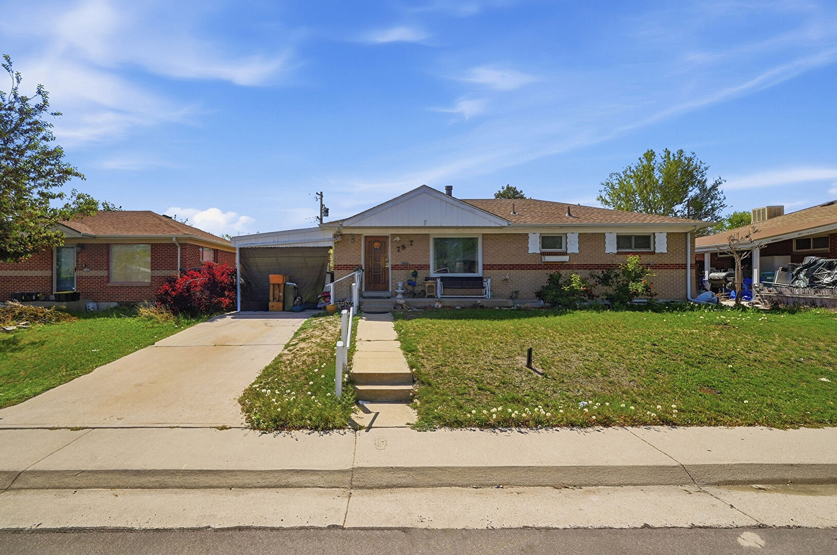 Front at 7887 Quivas Way, Denver, CO 80221, listed by Margaret Gade