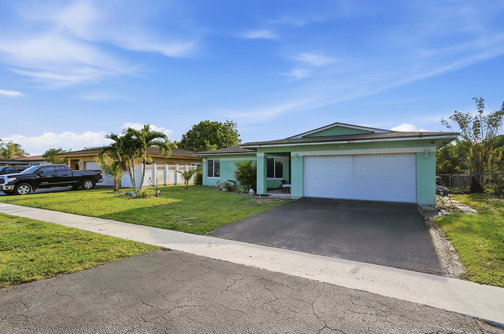 Front at 8271 Northwest 68th Terrace, Tamarac, FL 33321, listed by Ana Garcia