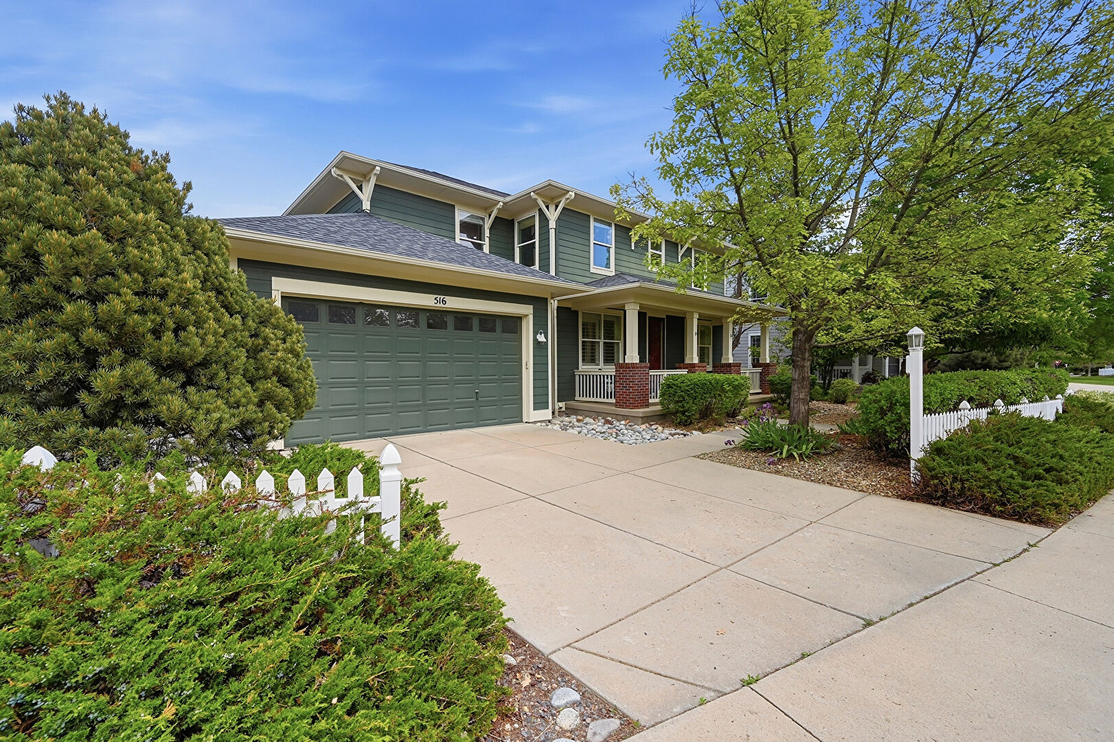Front at 516 Indian Peaks Trail West, Lafayette, CO 80026, listed by Brian MacDonald