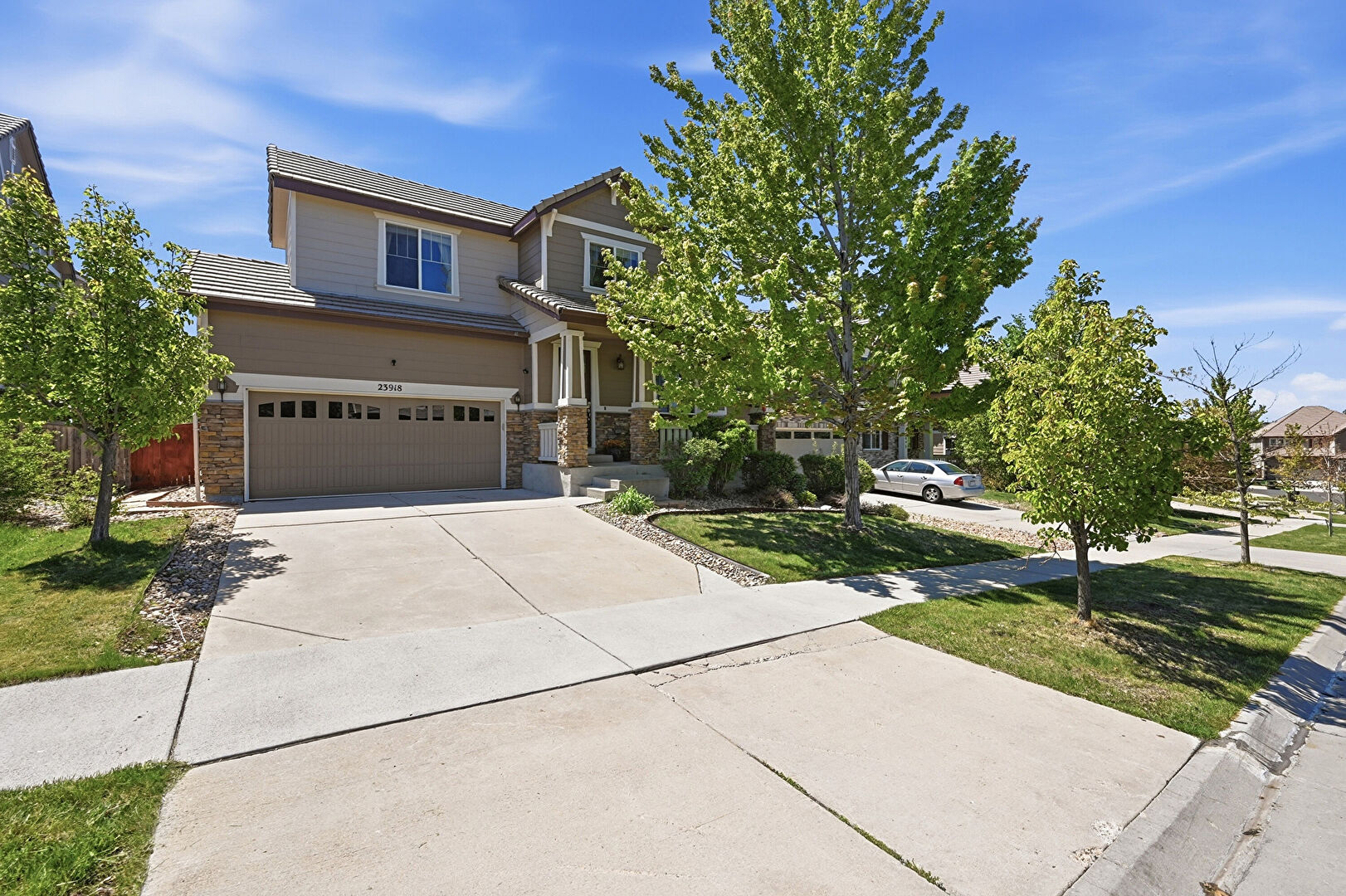 Front at 23918 East Alamo Place, Aurora, CO 80016, listed by Jason Ellis