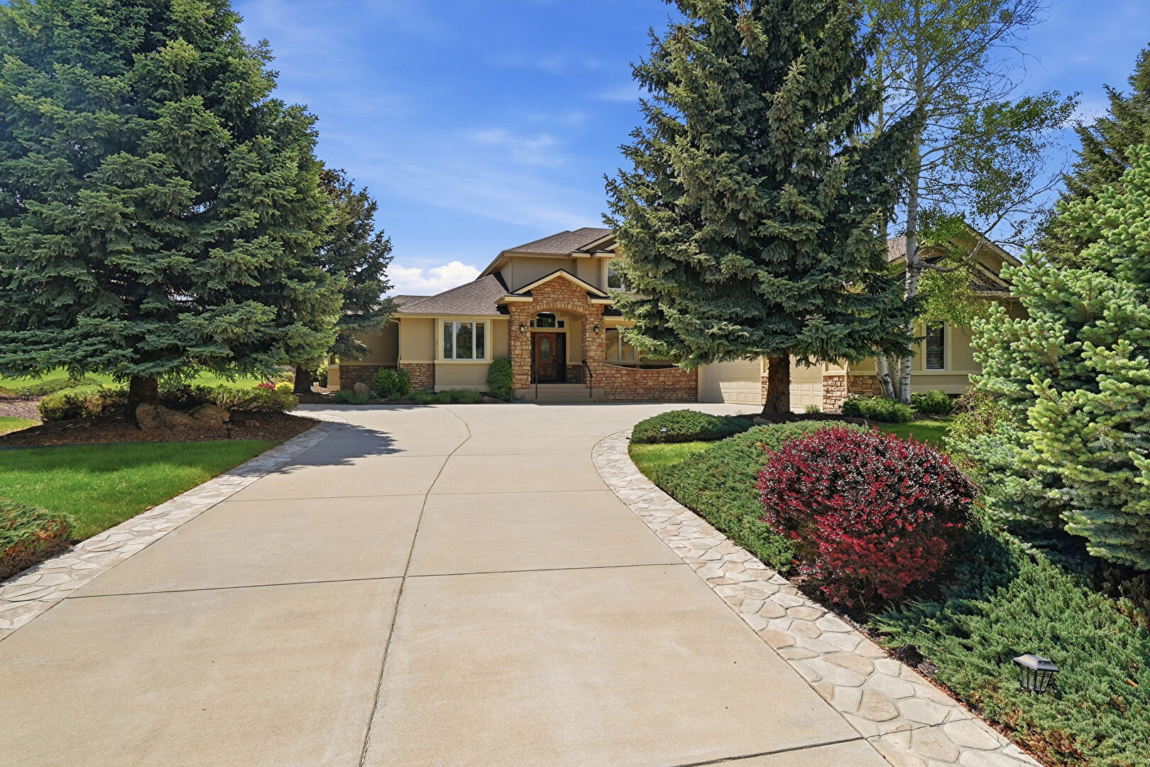 Front at 8903 Prairie Knoll Drive, Longmont, CO 80503, listed by James  (Jim) Candy