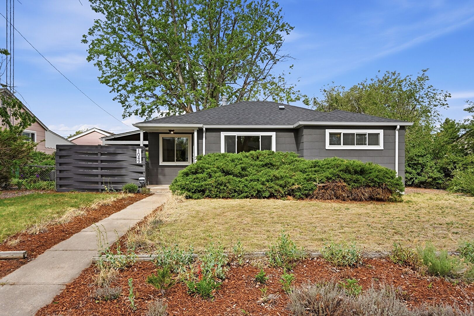 Front at 1049 Florence Street, Aurora, CO 80010, listed by Beth Gibson