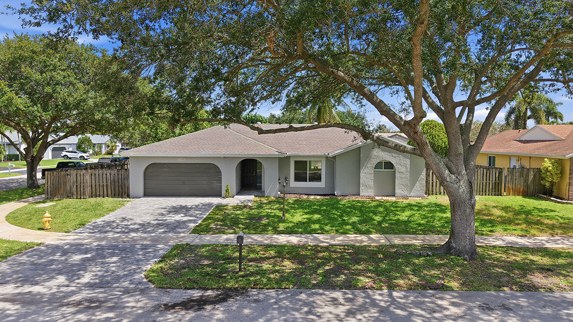 Front at 11991 Southwest 51st Court, Cooper City, FL 33330, listed by Shaina Bottfeld
