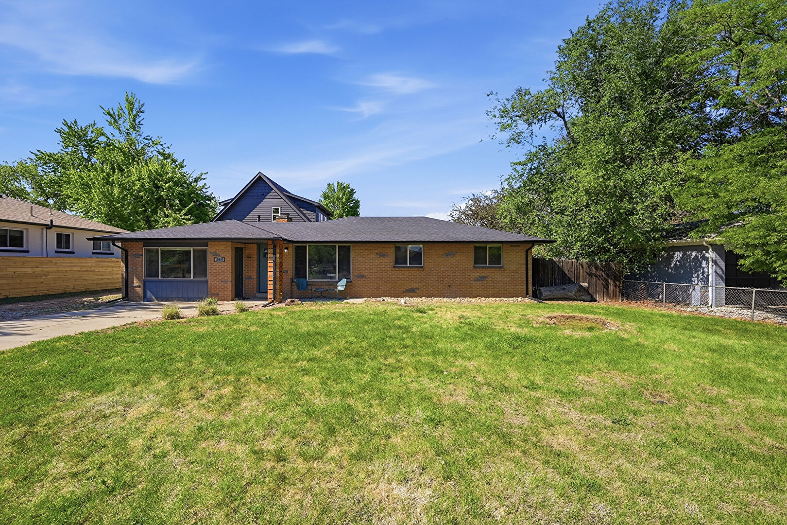 Front at 10685 West 47th Avenue, Wheat Ridge, CO 80033, listed by Amanda Lam