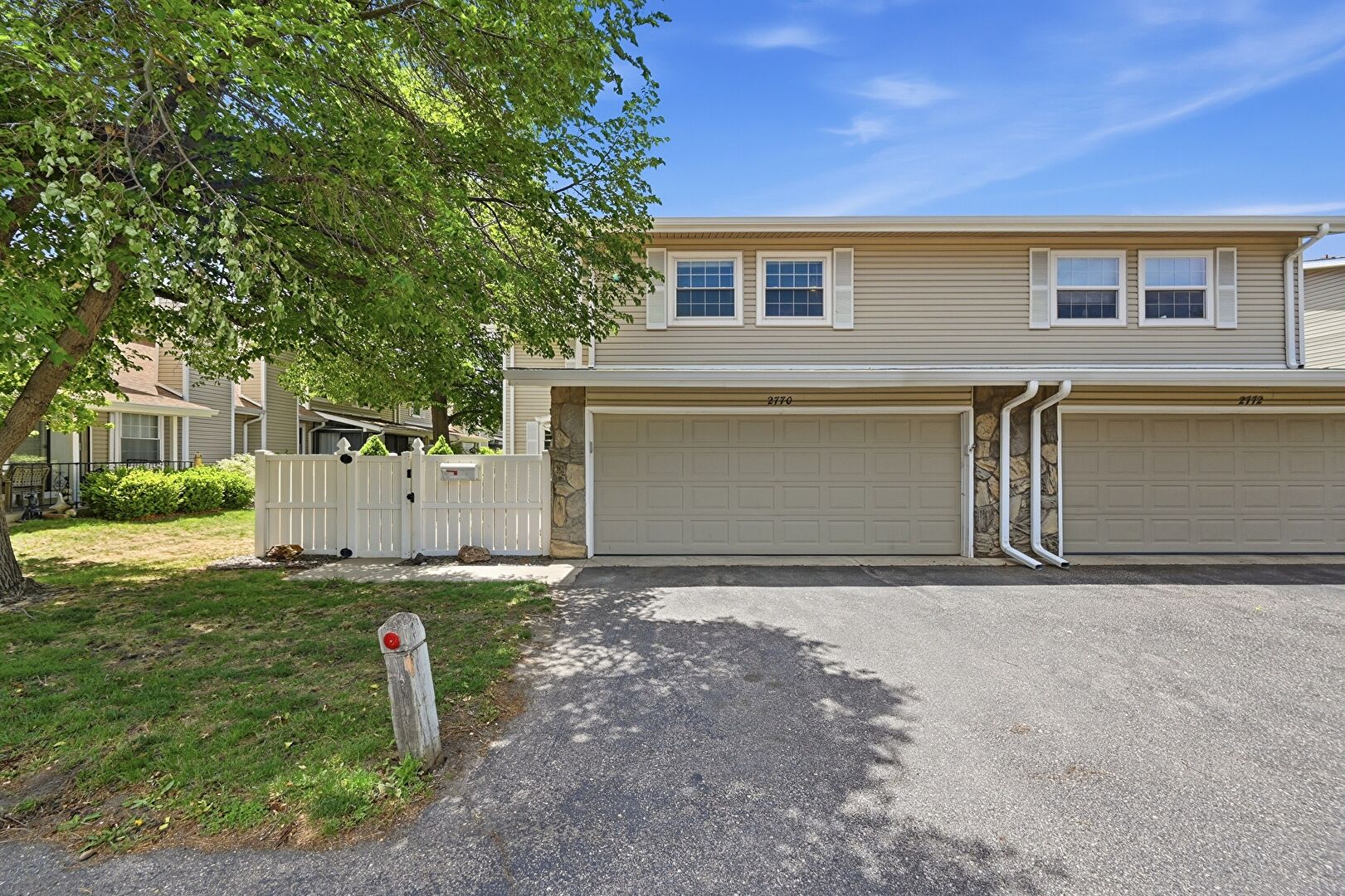 Front at 2770 South Heather Gardens Way, Aurora, CO 80014, listed by Karen Esquibel
