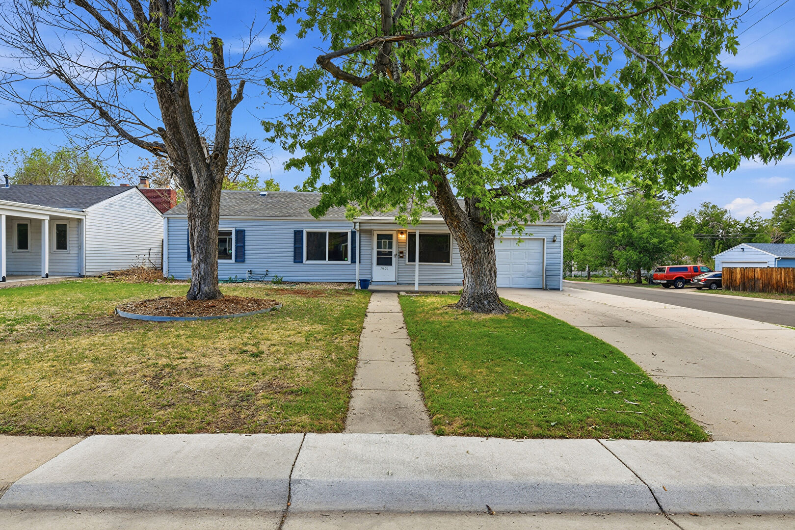 Front at 3001 South Grape Way, Denver, CO 80222, listed by Taylor Haas